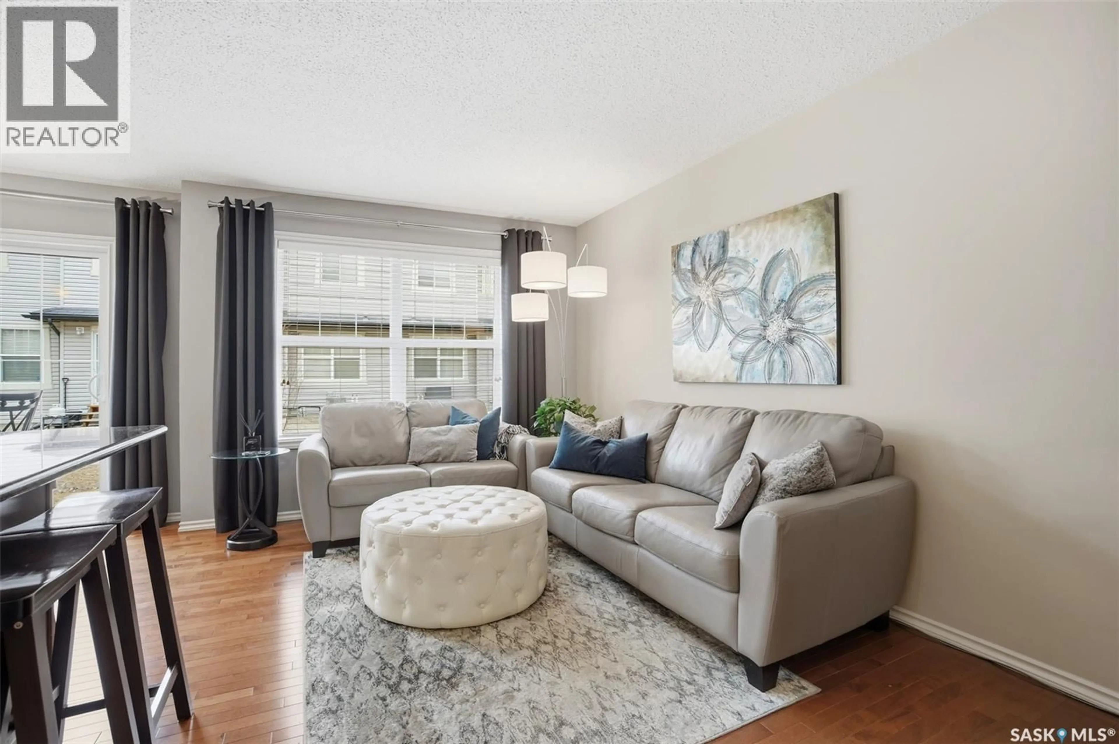 Living room with furniture, unknown for 105 - 218 LYND CRESCENT, Saskatoon Saskatchewan S7T0C3