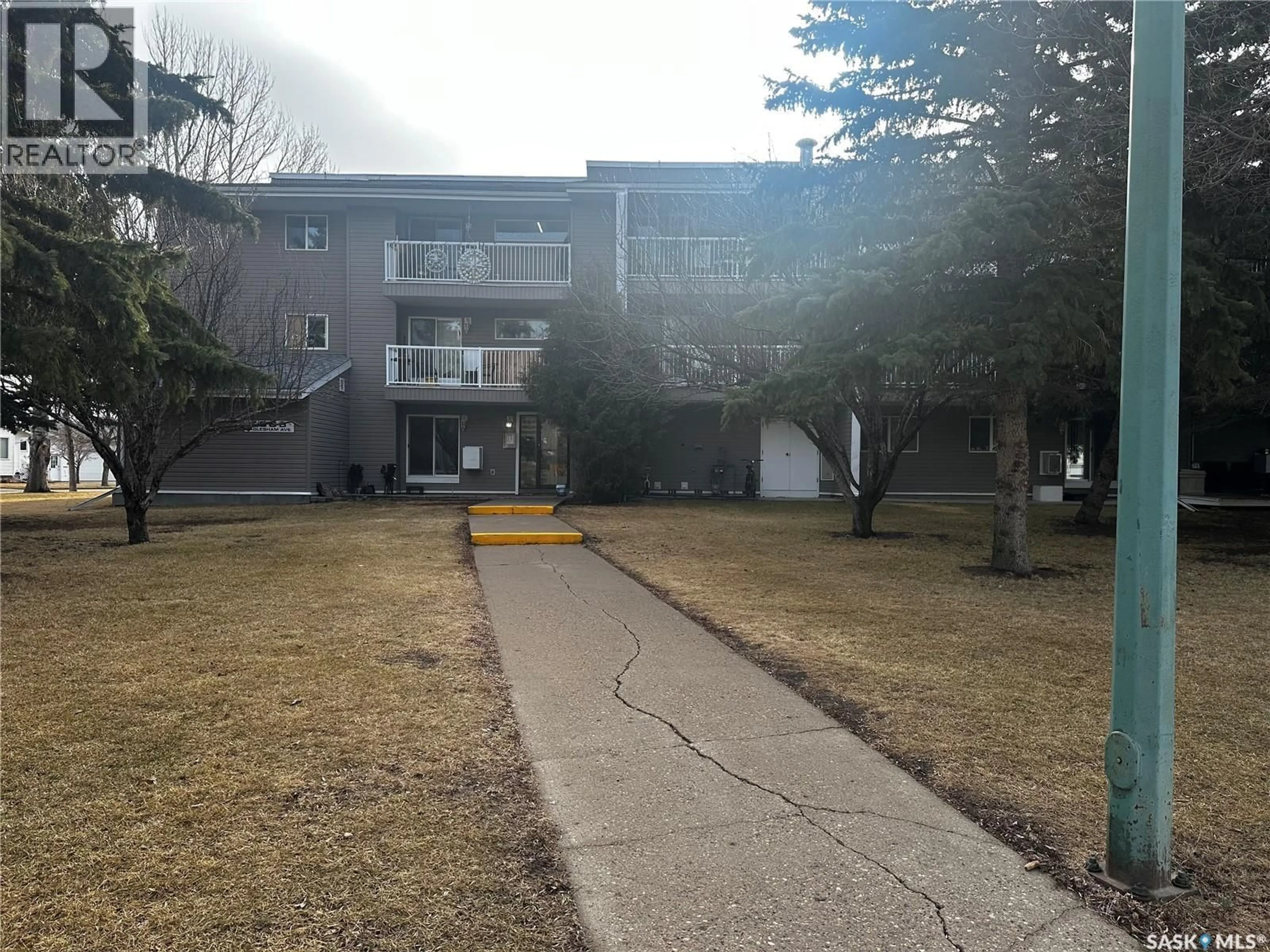 A pic from outside/outdoor area/front of a property/back of a property/a pic from drone, unknown for 302 1808 EAGLESHAM AVENUE, Weyburn Saskatchewan S4H3A8