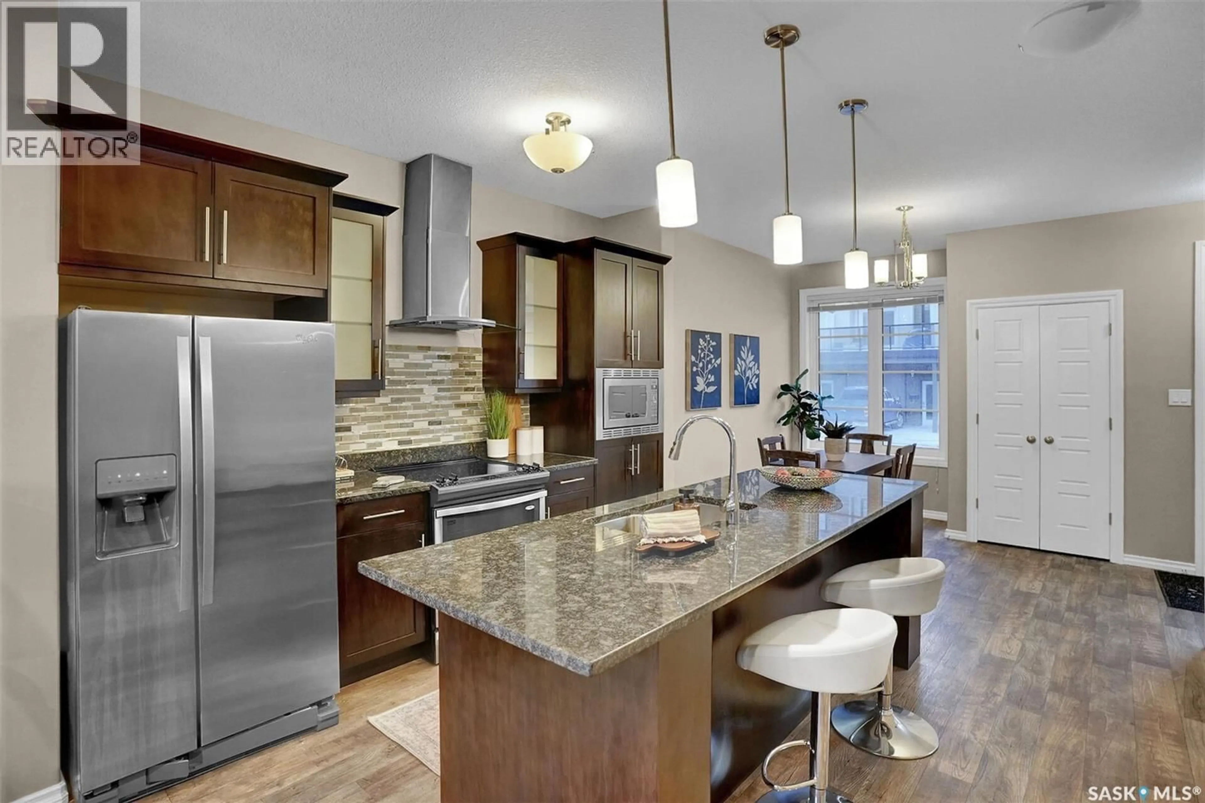 Open concept kitchen, ceramic/tile floor for 124 3229 ELGAARD DRIVE, Regina Saskatchewan S4X0L2