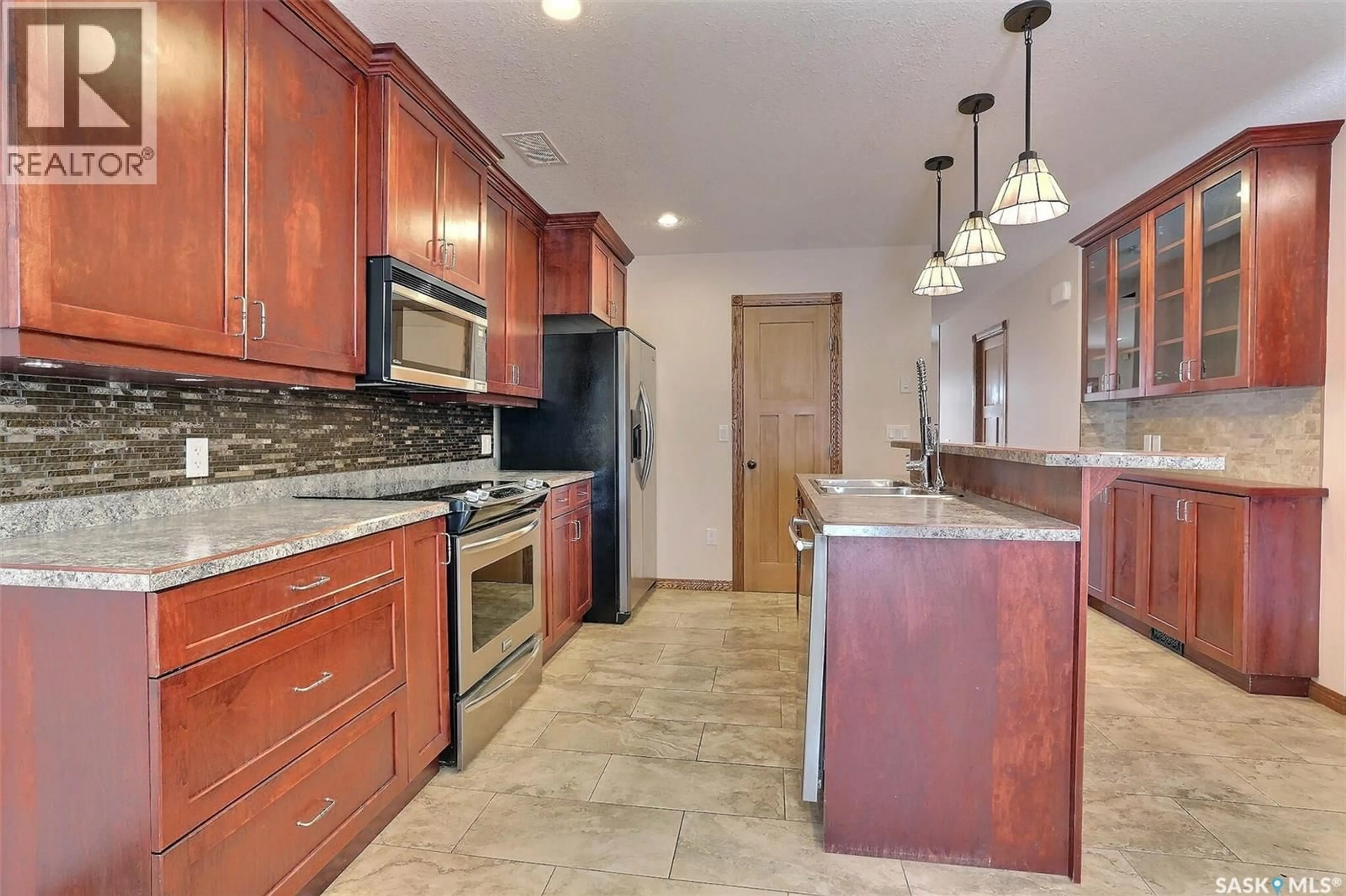 Open concept kitchen, ceramic/tile floor for A & B - 1928 ST JOHN STREET, Regina Saskatchewan S4P3C8
