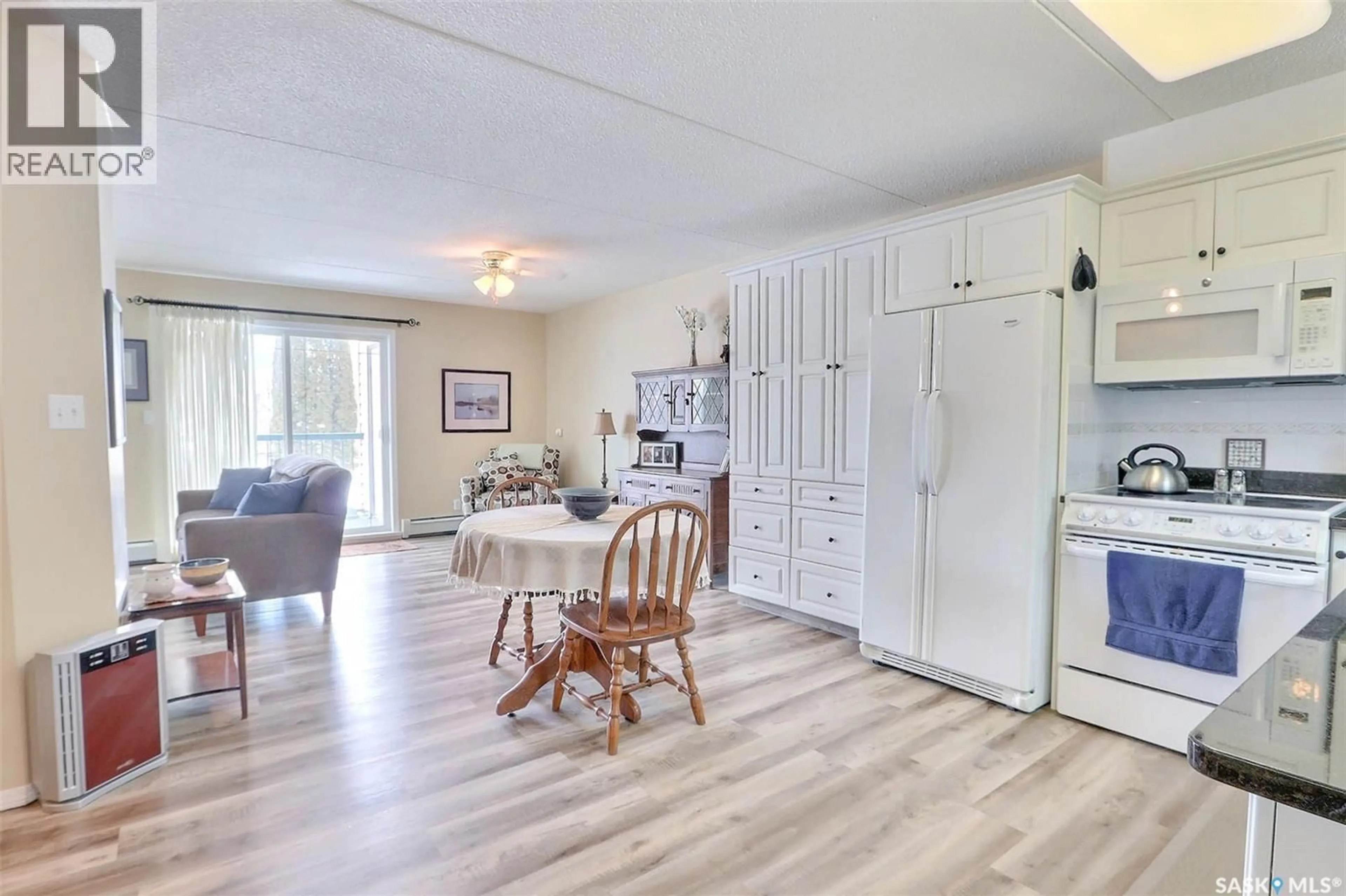 Open concept kitchen, unknown for E - 201 1 26TH STREET, Prince Albert Saskatchewan S6V1T7