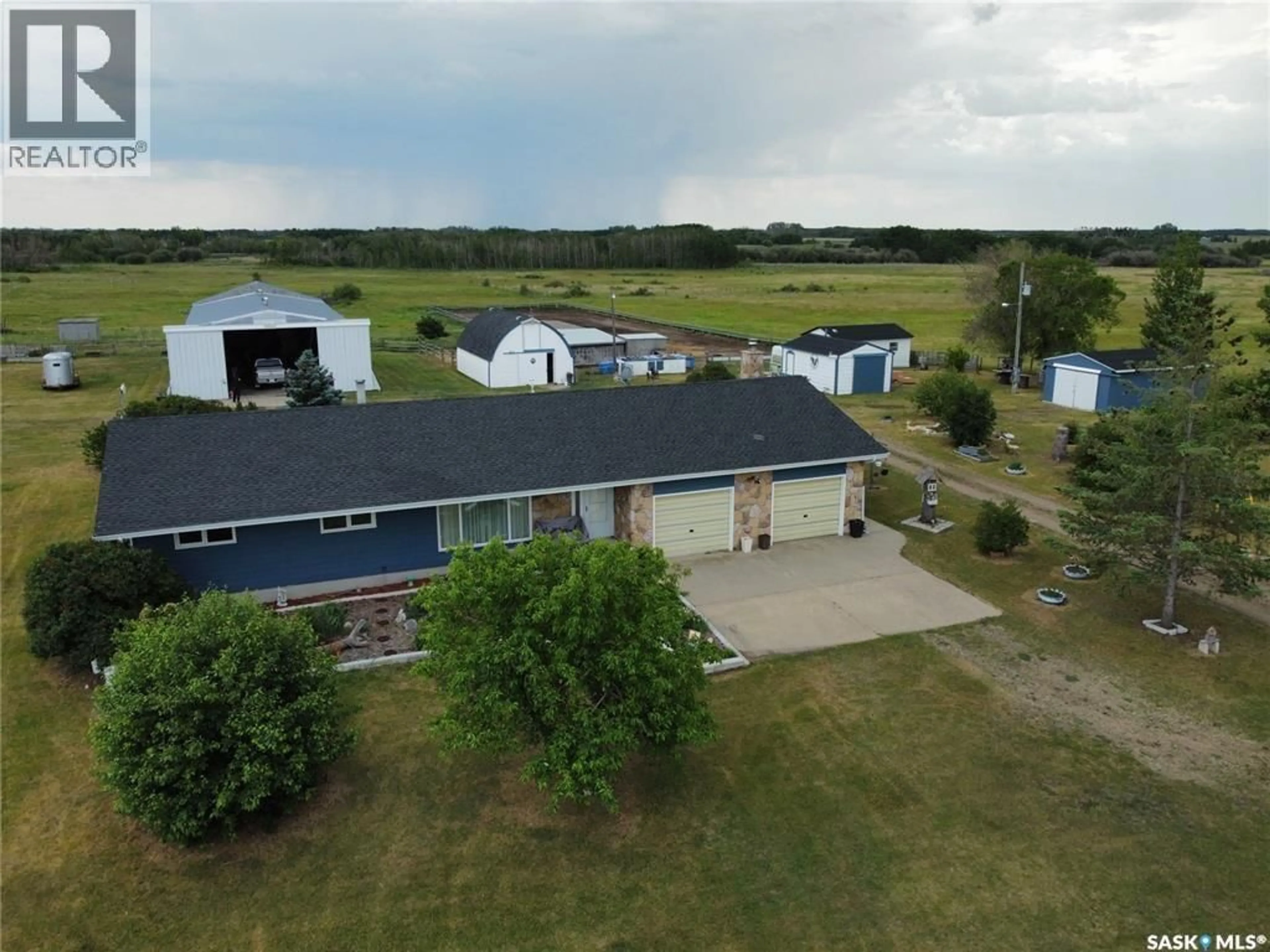 A pic from outside/outdoor area/front of a property/back of a property/a pic from drone, building for 55 GRANDORA ACRE HOBBY FARM, Vanscoy Rm No. 345 Saskatchewan S0K1V0