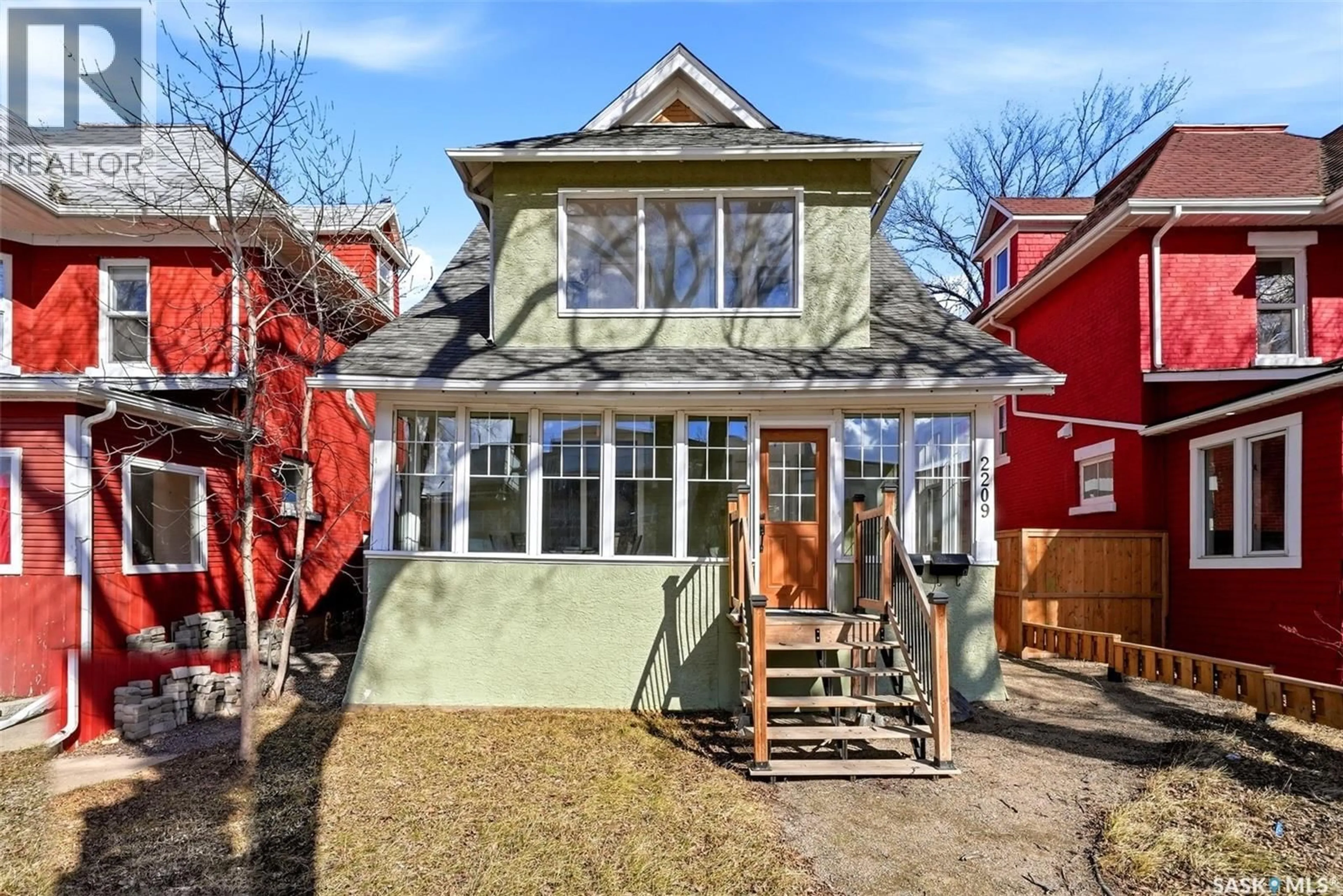 Home with brick exterior material, street for 2209 TORONTO STREET, Regina Saskatchewan S4P1N5