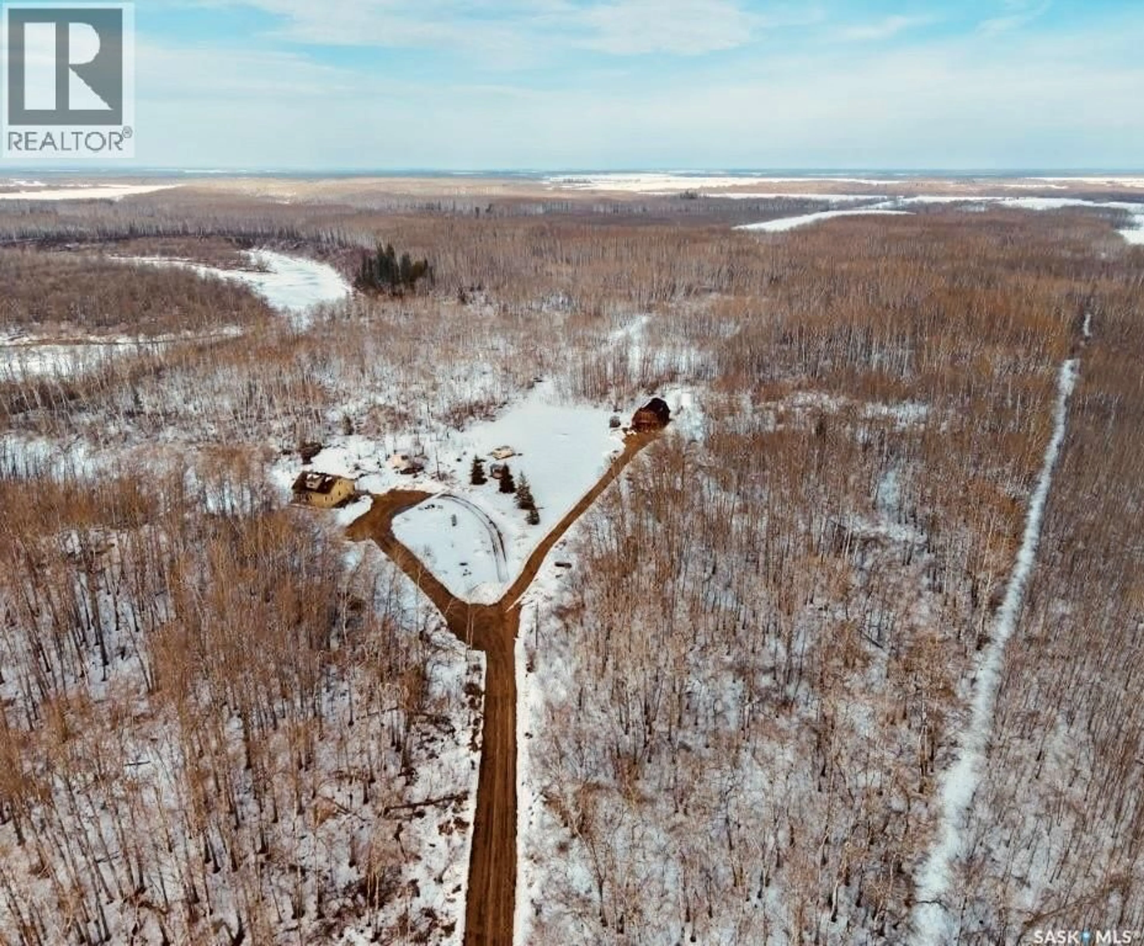 A pic from outside/outdoor area/front of a property/back of a property/a pic from drone, forest/trees view for 80 ACRES RIVER EDGE, Hudson Bay Rm No. 394 Saskatchewan S0E0Y0