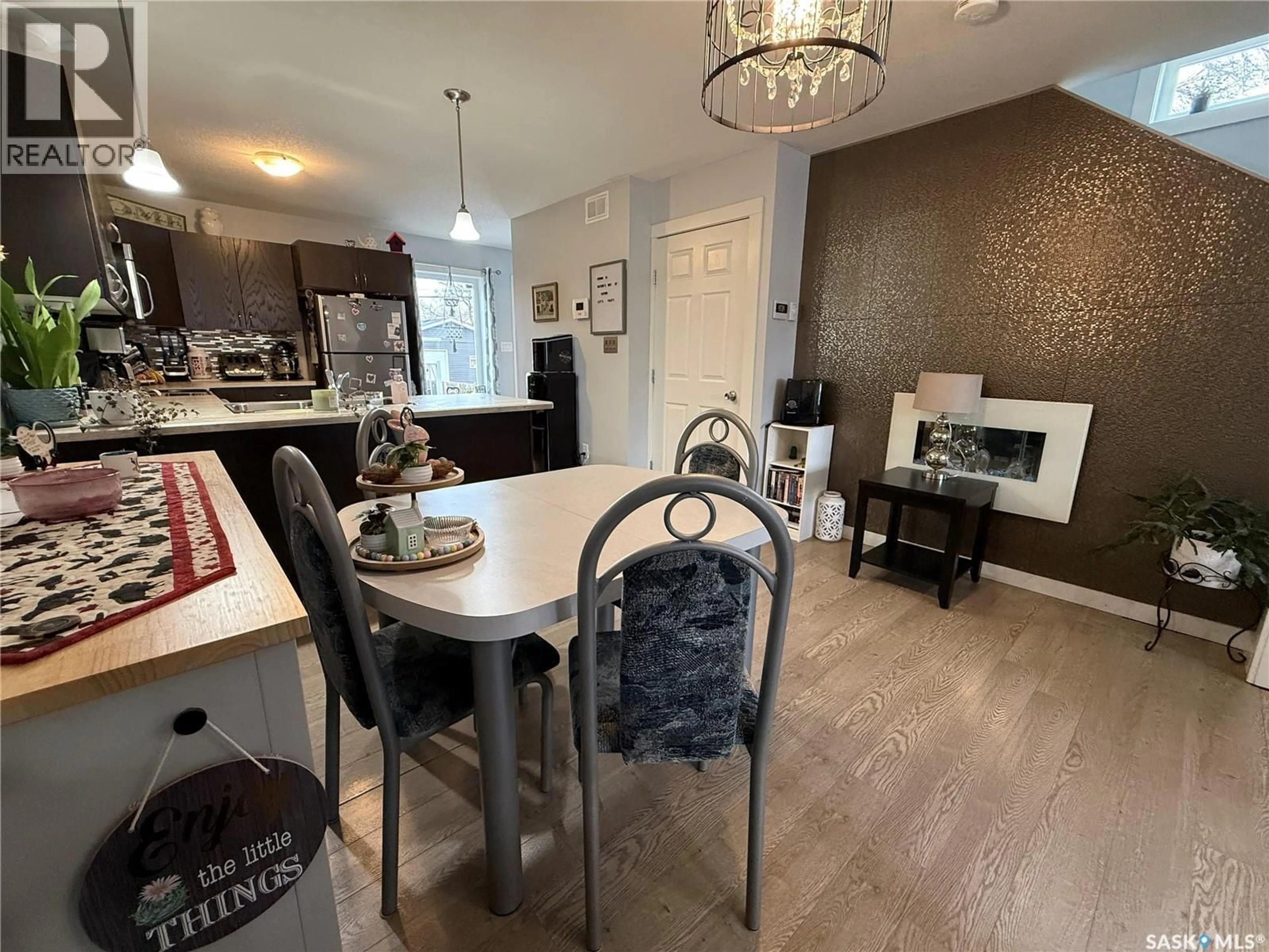 Dining room, wood/laminate floor for 529 ALEXANDRA STREET, Weyburn Saskatchewan S4H1R7