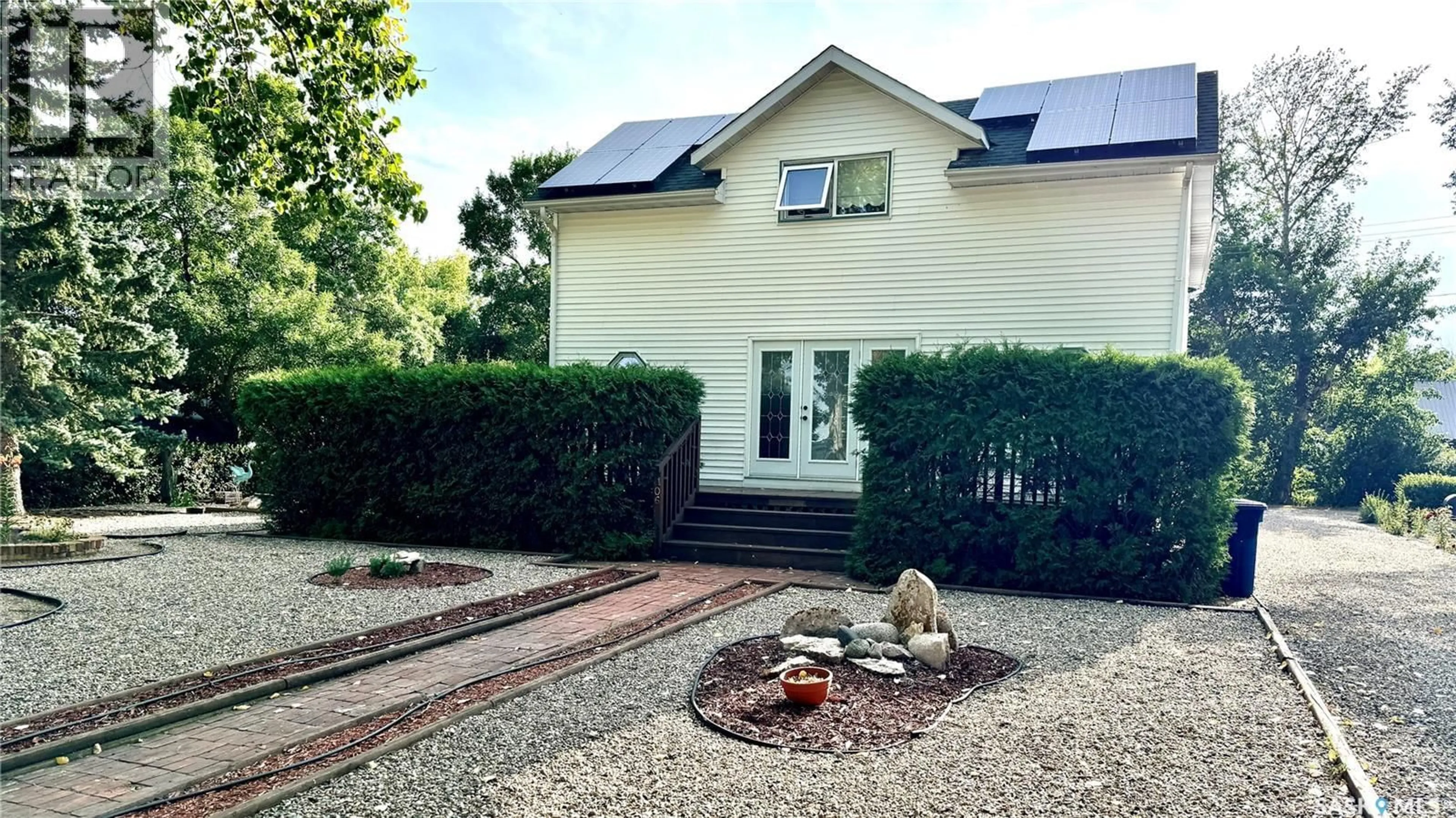 A pic from outside/outdoor area/front of a property/back of a property/a pic from drone, street for 106 2ND STREET, Dinsmore Saskatchewan S0L0T0