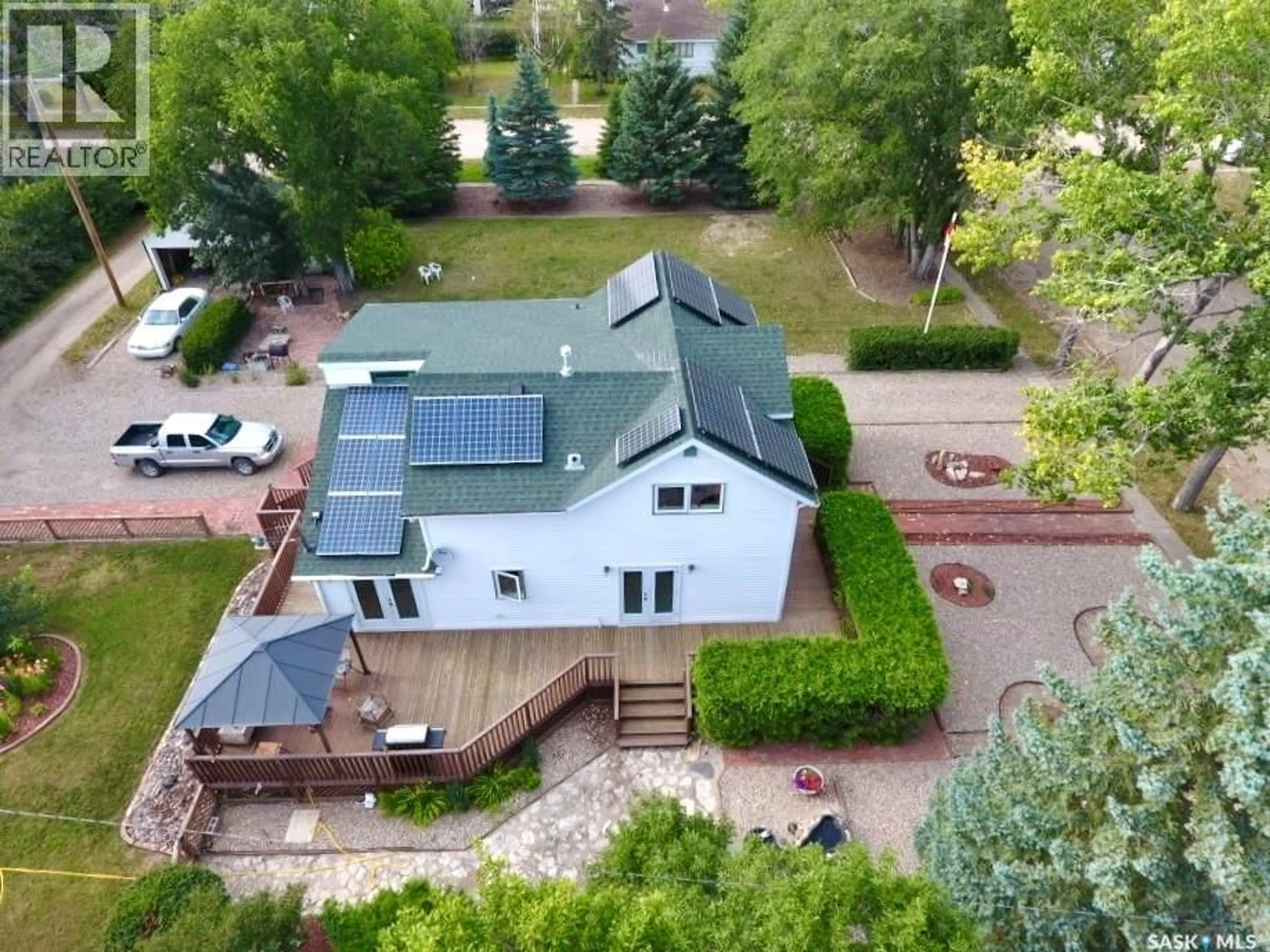 A pic from outside/outdoor area/front of a property/back of a property/a pic from drone, building for 106 2ND STREET, Dinsmore Saskatchewan S0L0T0