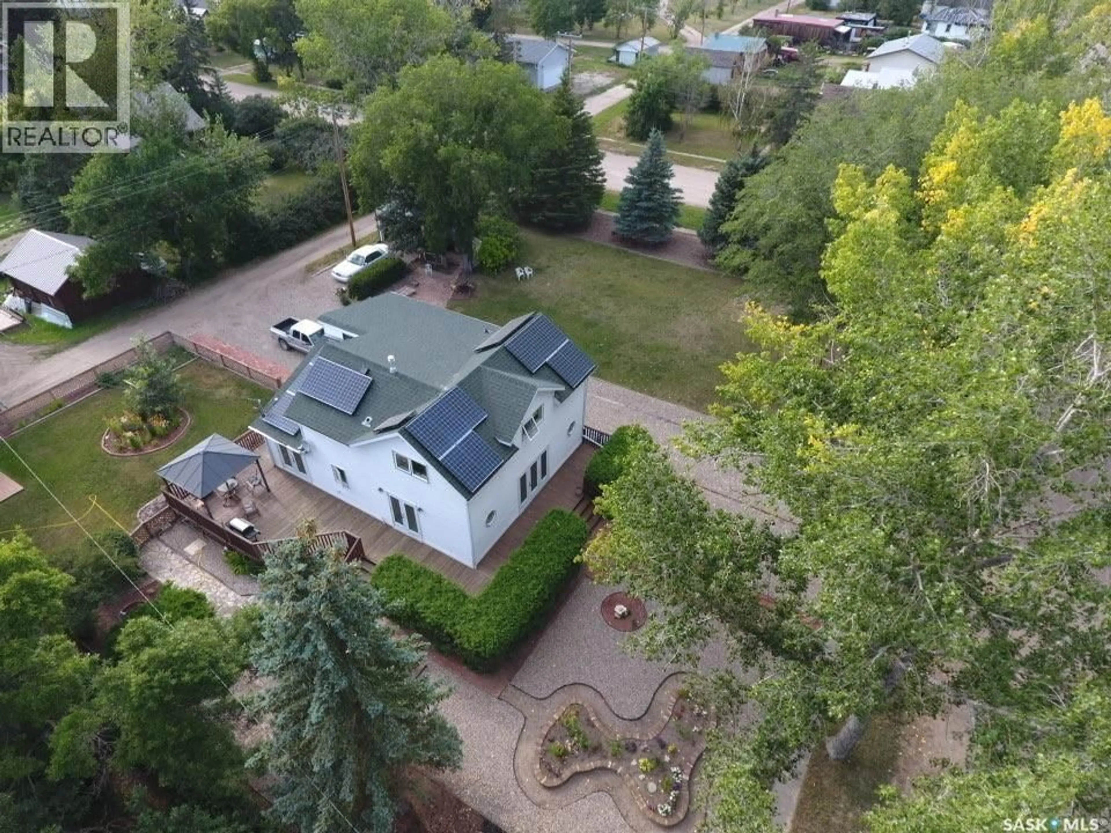 A pic from outside/outdoor area/front of a property/back of a property/a pic from drone, unknown for 106 2ND STREET, Dinsmore Saskatchewan S0L0T0
