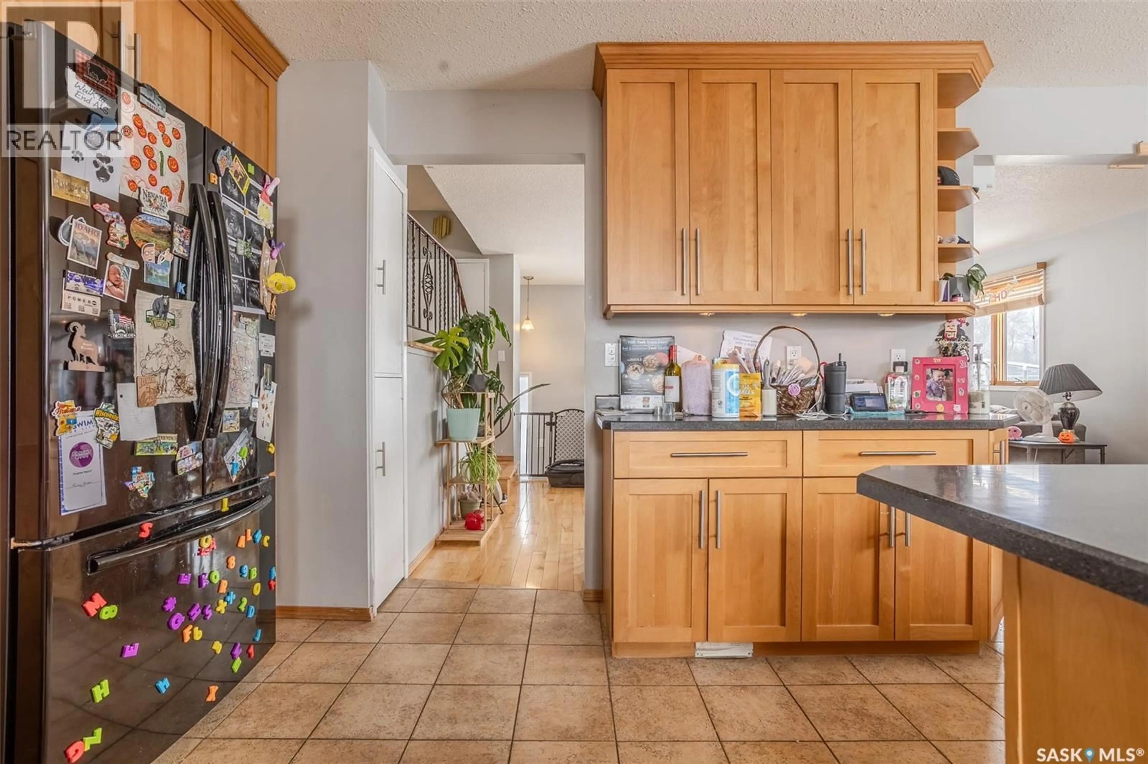 Open concept kitchen, ceramic/tile floor for 60 CLARK CRESCENT, Saskatoon Saskatchewan S7H3L9