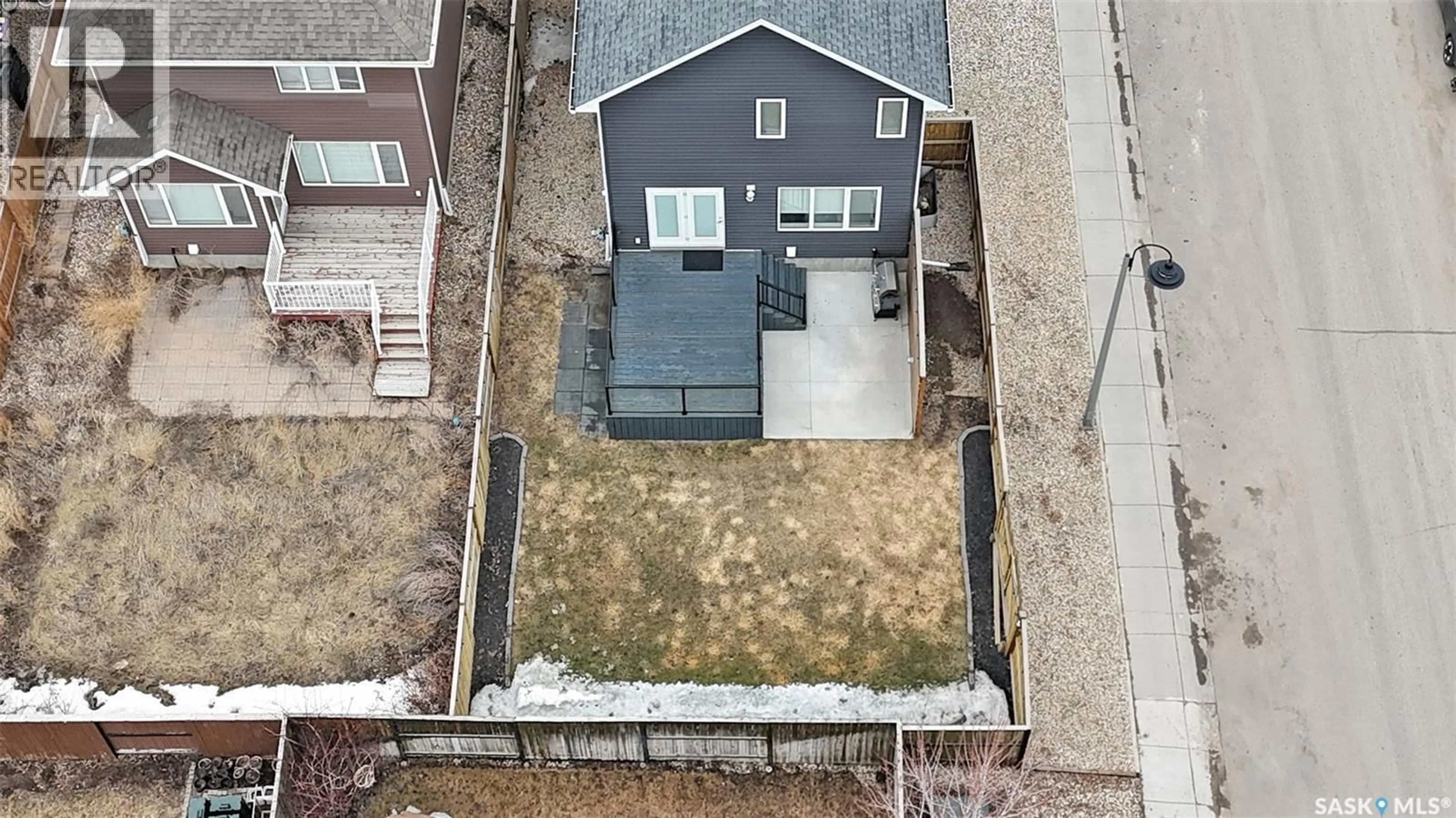 A pic from outside/outdoor area/front of a property/back of a property/a pic from drone, street for 270 LEWIN CRESCENT, Saskatoon Saskatchewan S7T0T3