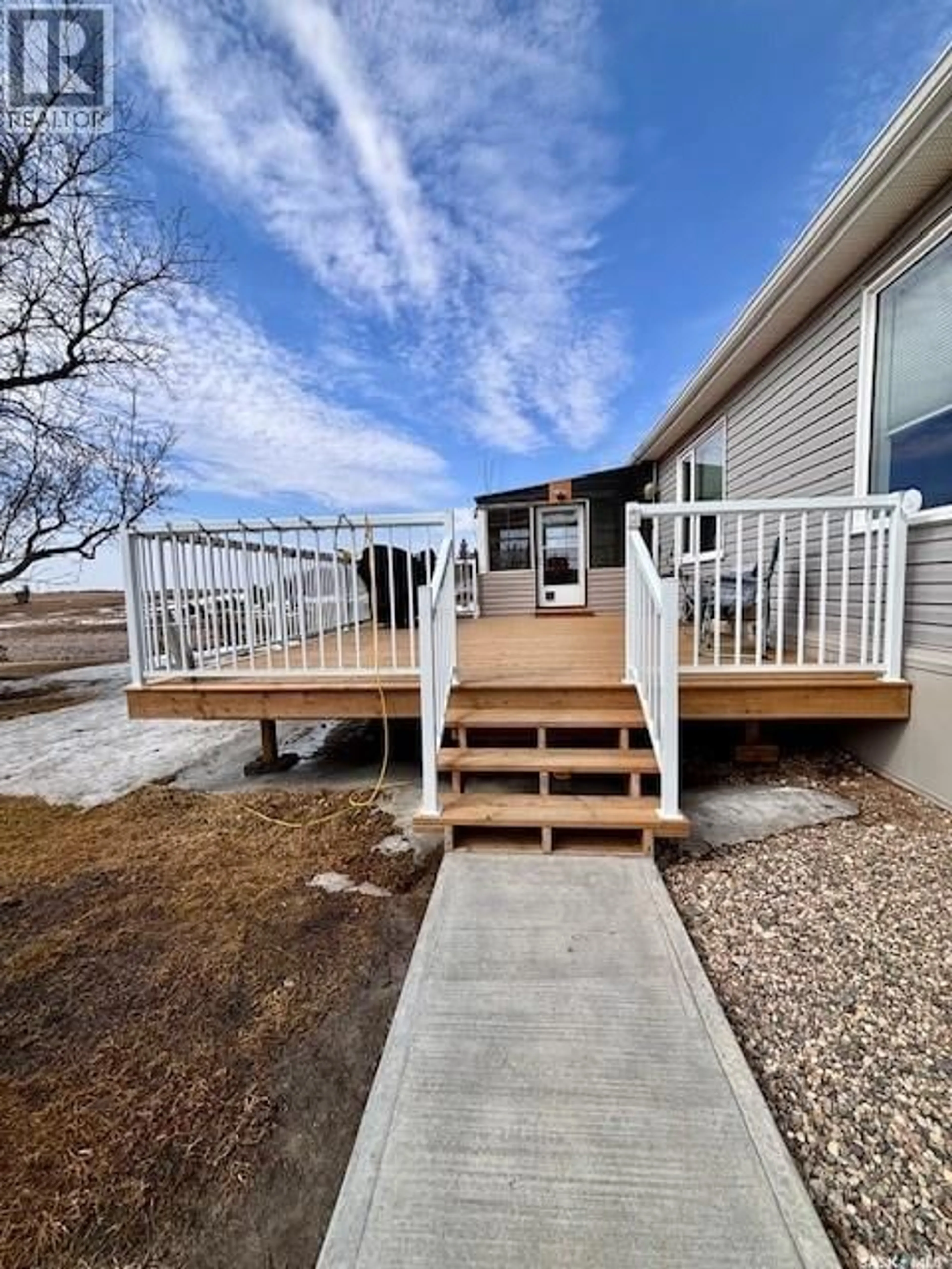 Home with vinyl exterior material, street for 18 BURGESS STREET, Fleming Saskatchewan S0G1R0