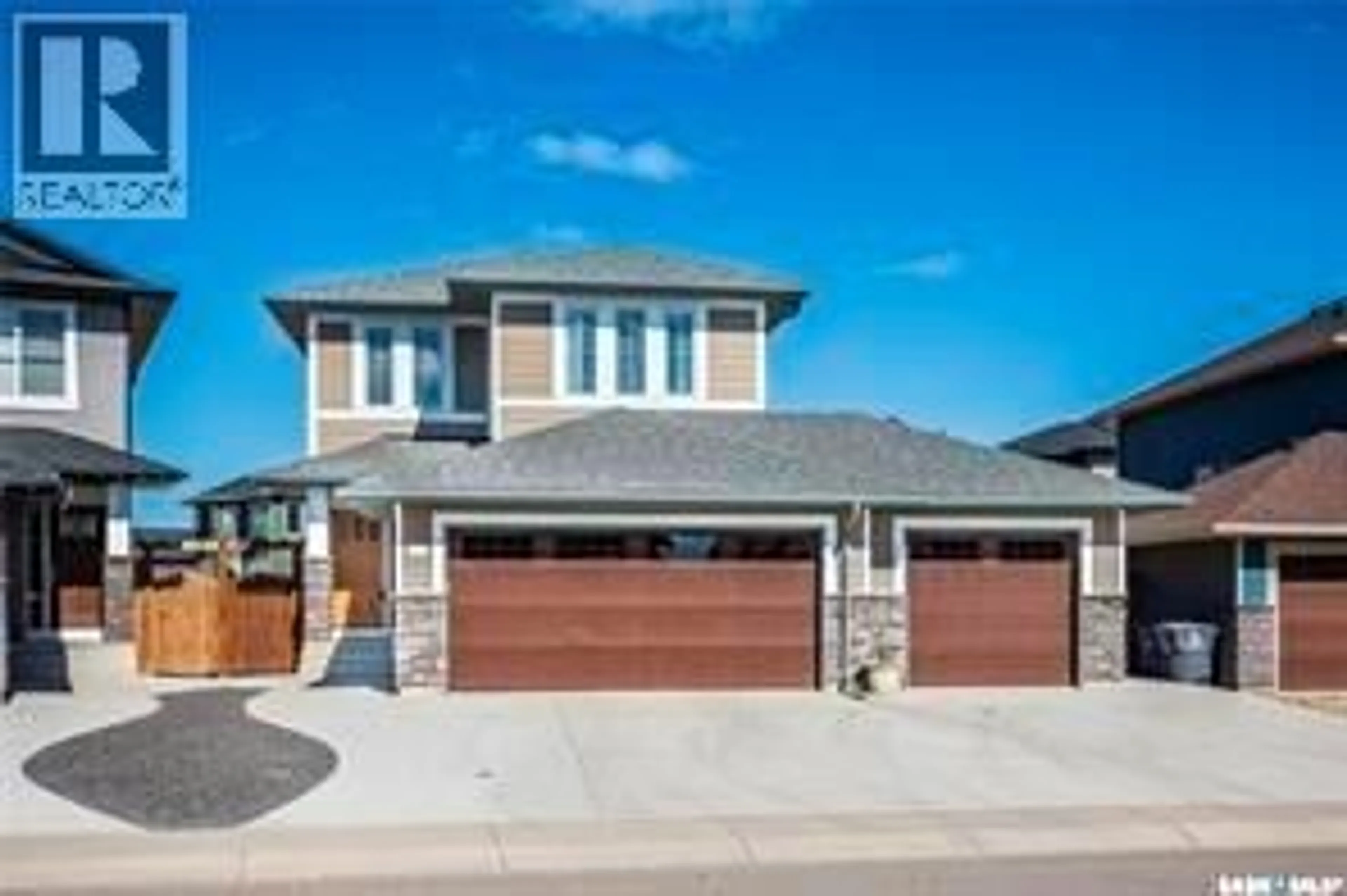 Home with brick exterior material, street for 611 PICHLER CRESCENT, Saskatoon Saskatchewan S7V0G2