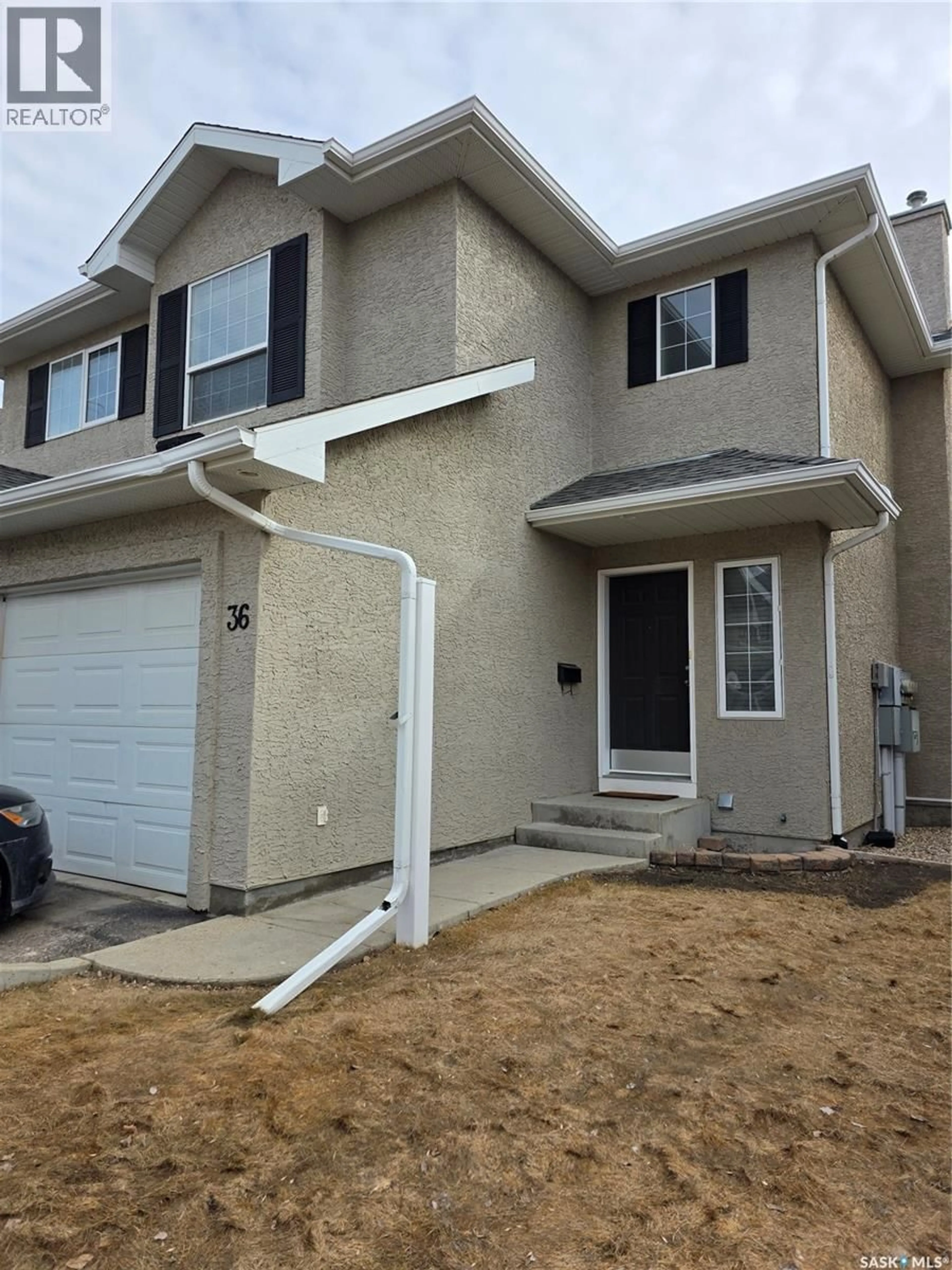 Home with vinyl exterior material, street for 103 - 36 BANYAN CRESCENT, Saskatoon Saskatchewan S7V1G3