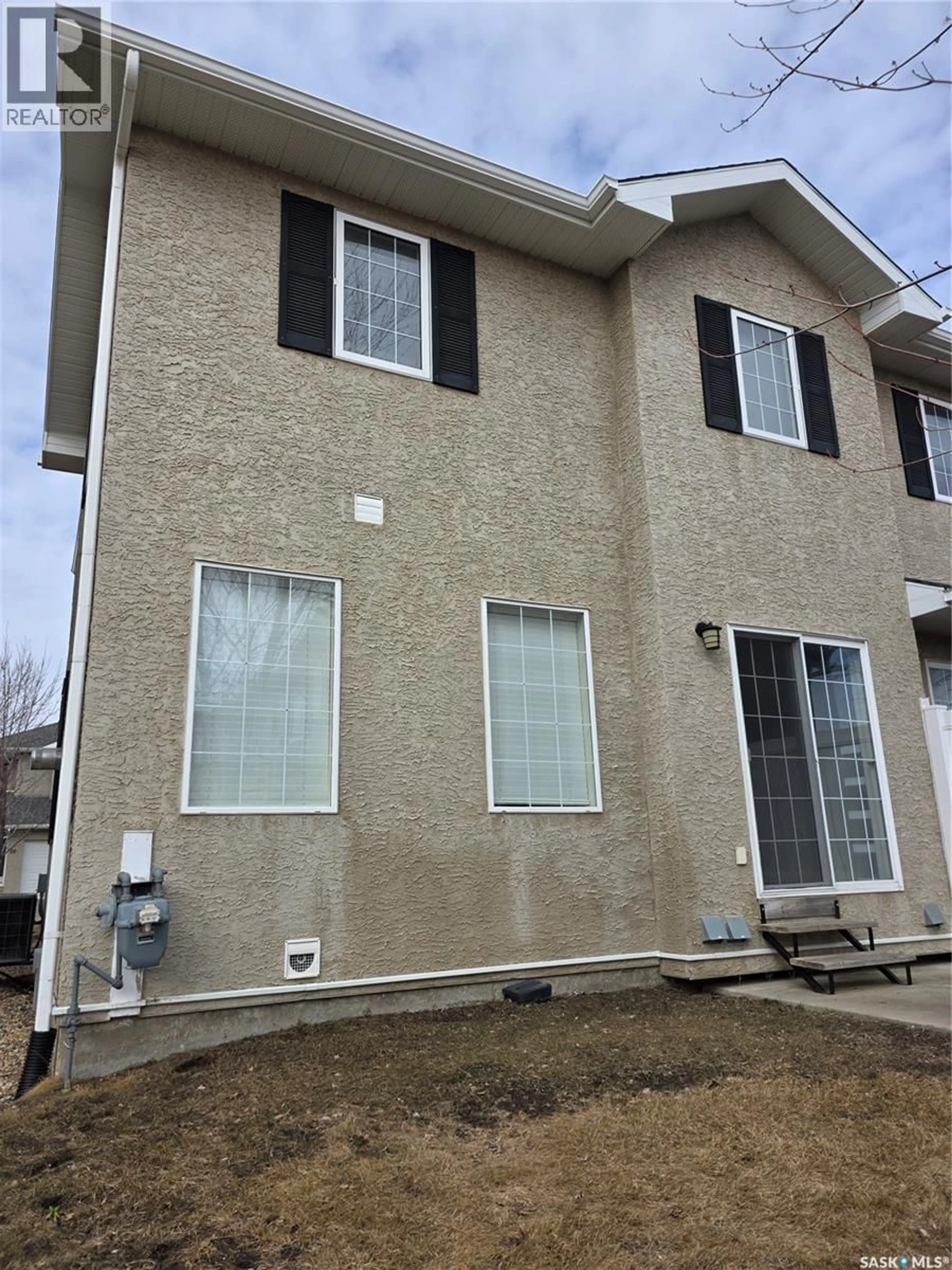 Home with vinyl exterior material, building for 103 - 36 BANYAN CRESCENT, Saskatoon Saskatchewan S7V1G3