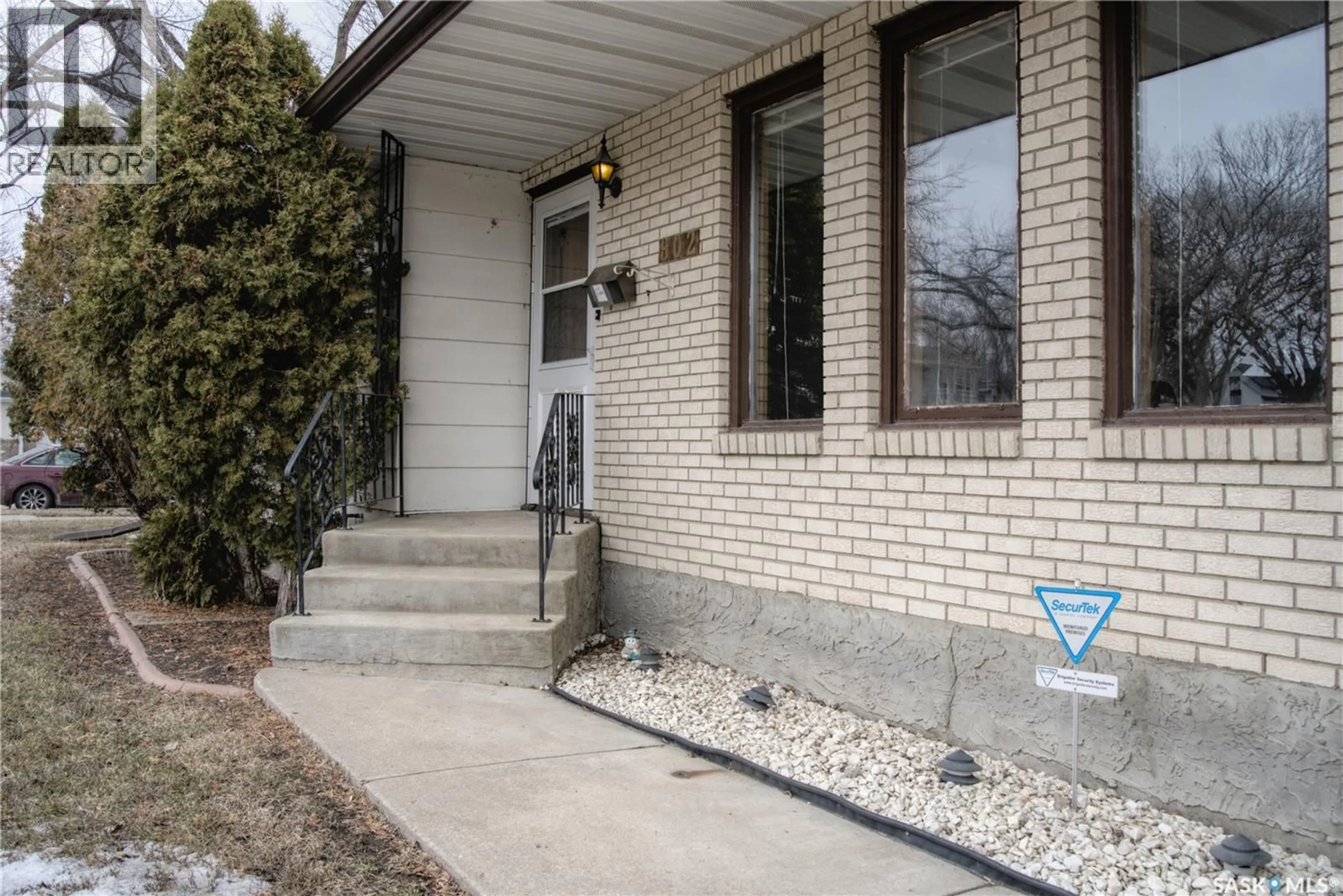 Home with brick exterior material, street for 802 7TH STREET, Saskatoon Saskatchewan S7H0Y4