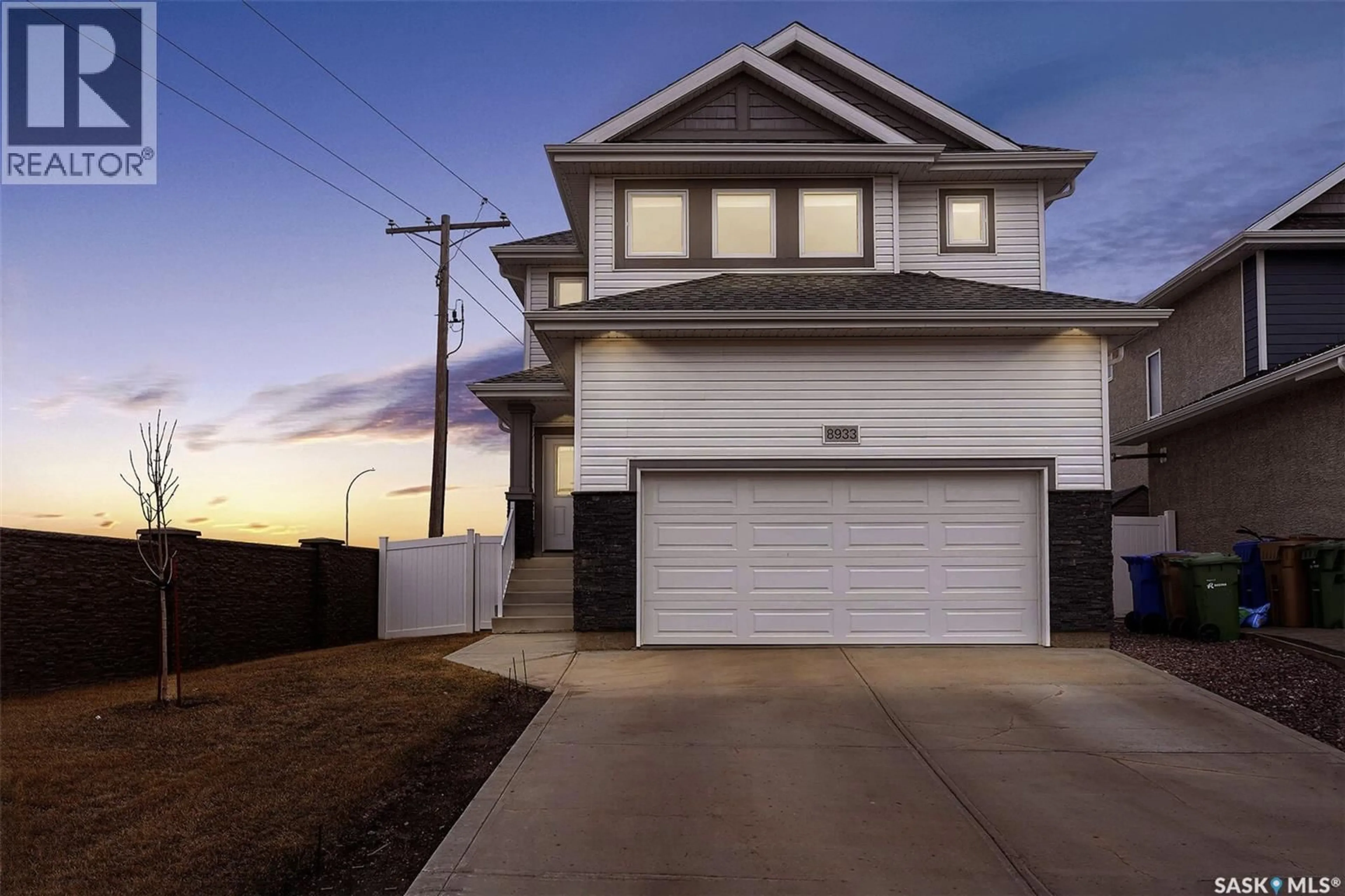 Home with vinyl exterior material, street for 8933 KESTRAL DRIVE, Regina Saskatchewan S4Y0C2