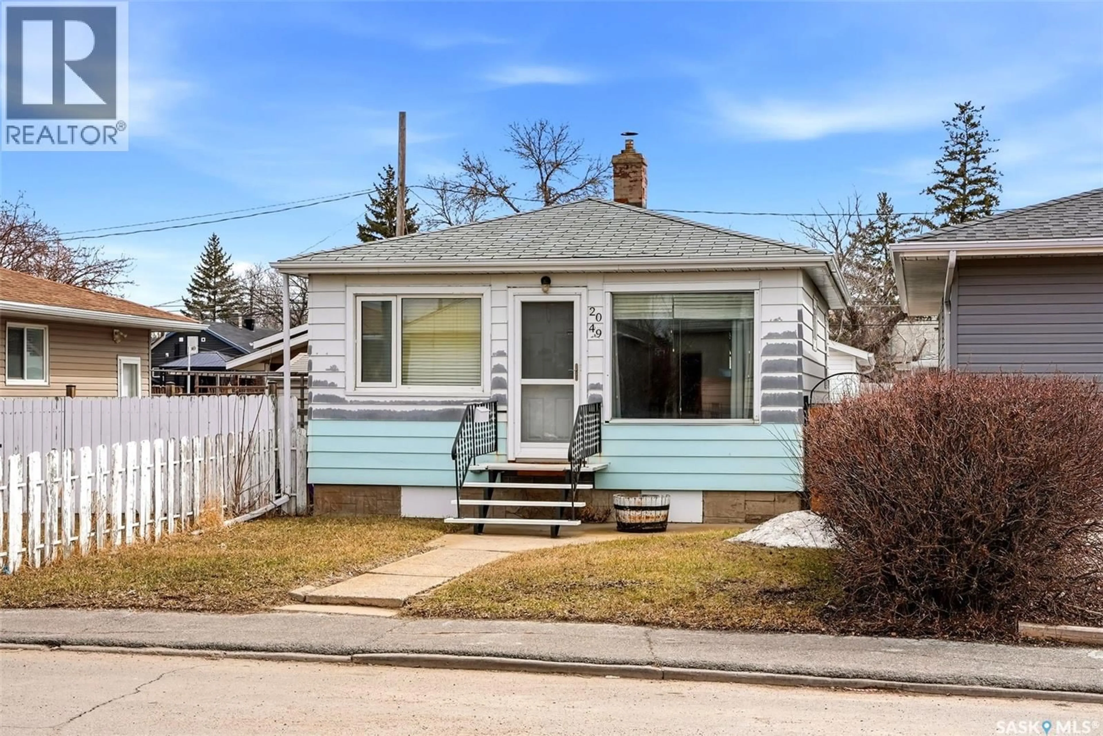 Home with vinyl exterior material, street for 2049 FLEURY STREET, Regina Saskatchewan S4N2M1
