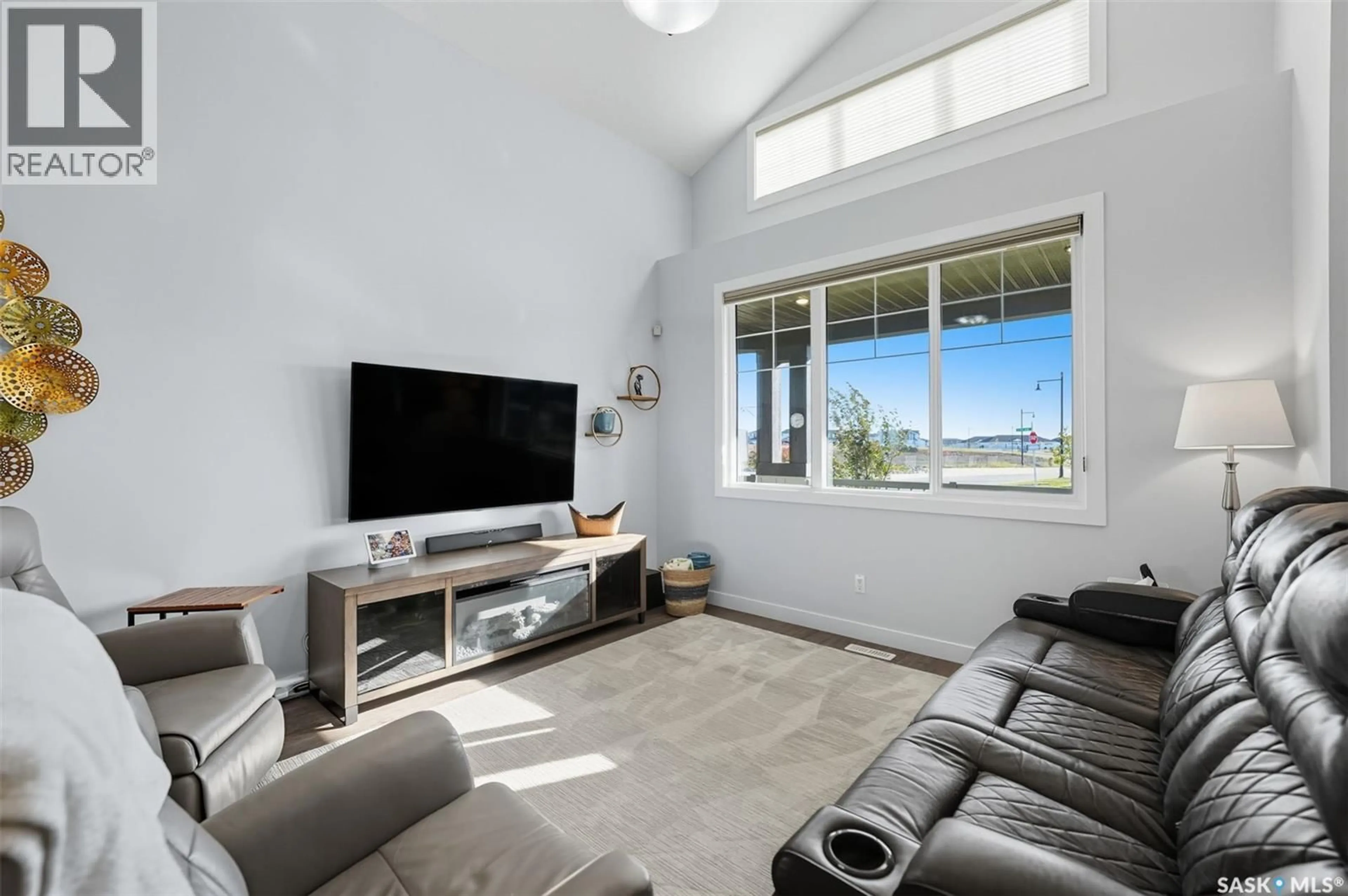 Living room with furniture, unknown for 687 SECORD BEND, Saskatoon Saskatchewan S7V0M7