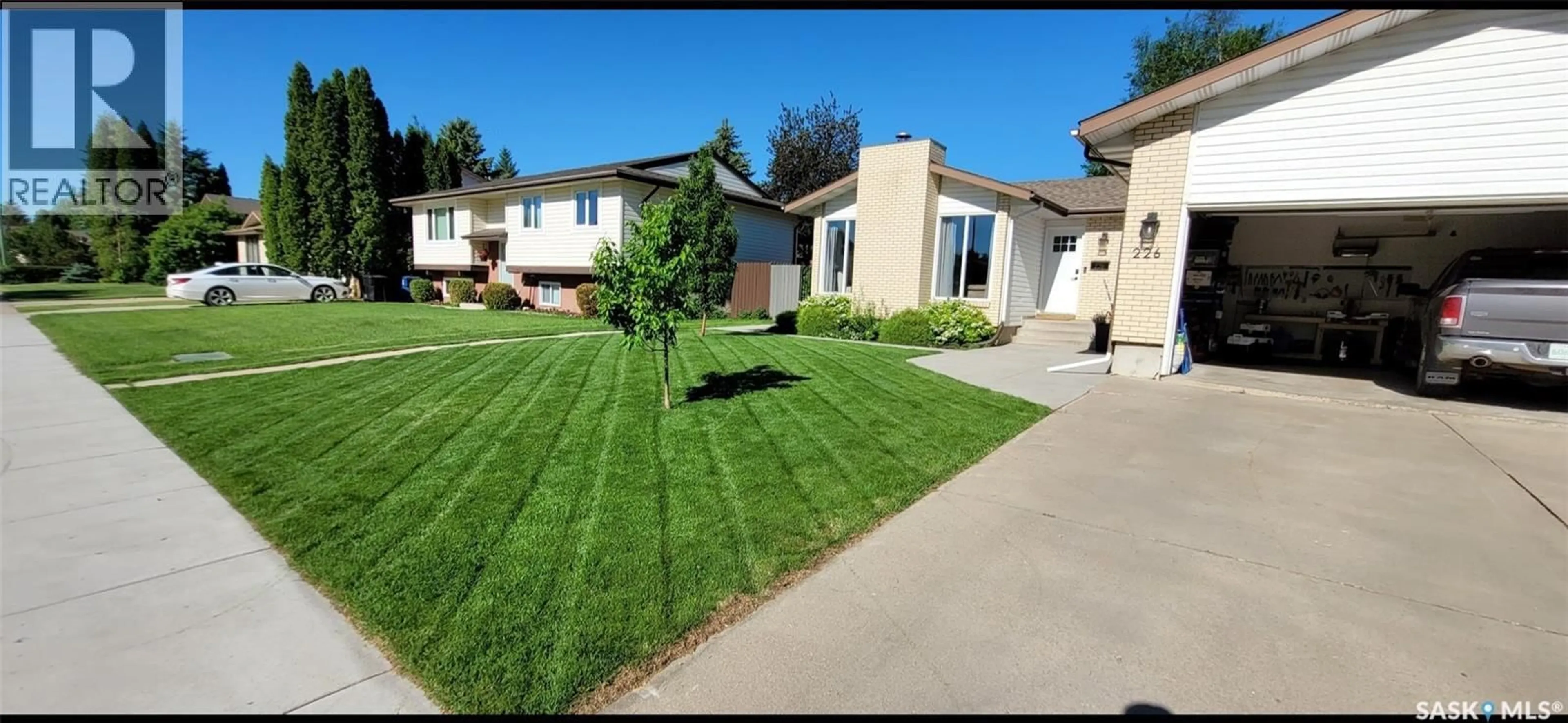 A pic from outside/outdoor area/front of a property/back of a property/a pic from drone, street for 226 CANDLE CRESCENT, Saskatoon Saskatchewan S7K5A4