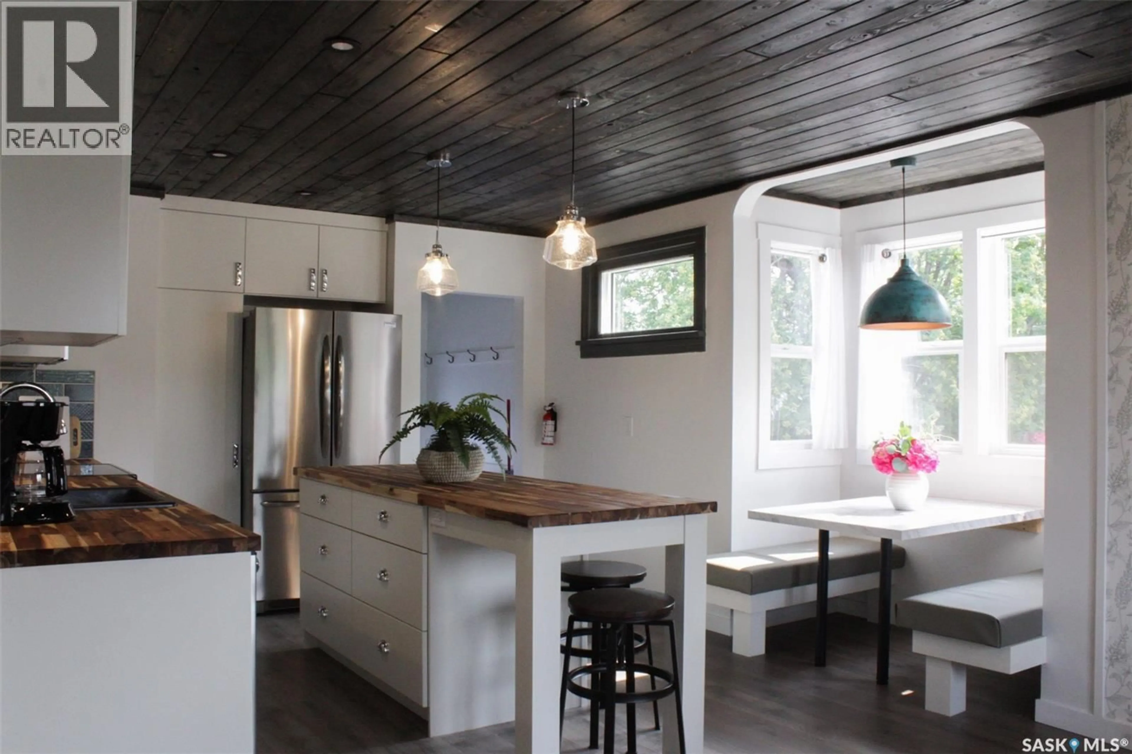 Open concept kitchen, wood/laminate floor for 2014 3RD STREET, Rosthern Saskatchewan S0K3R0