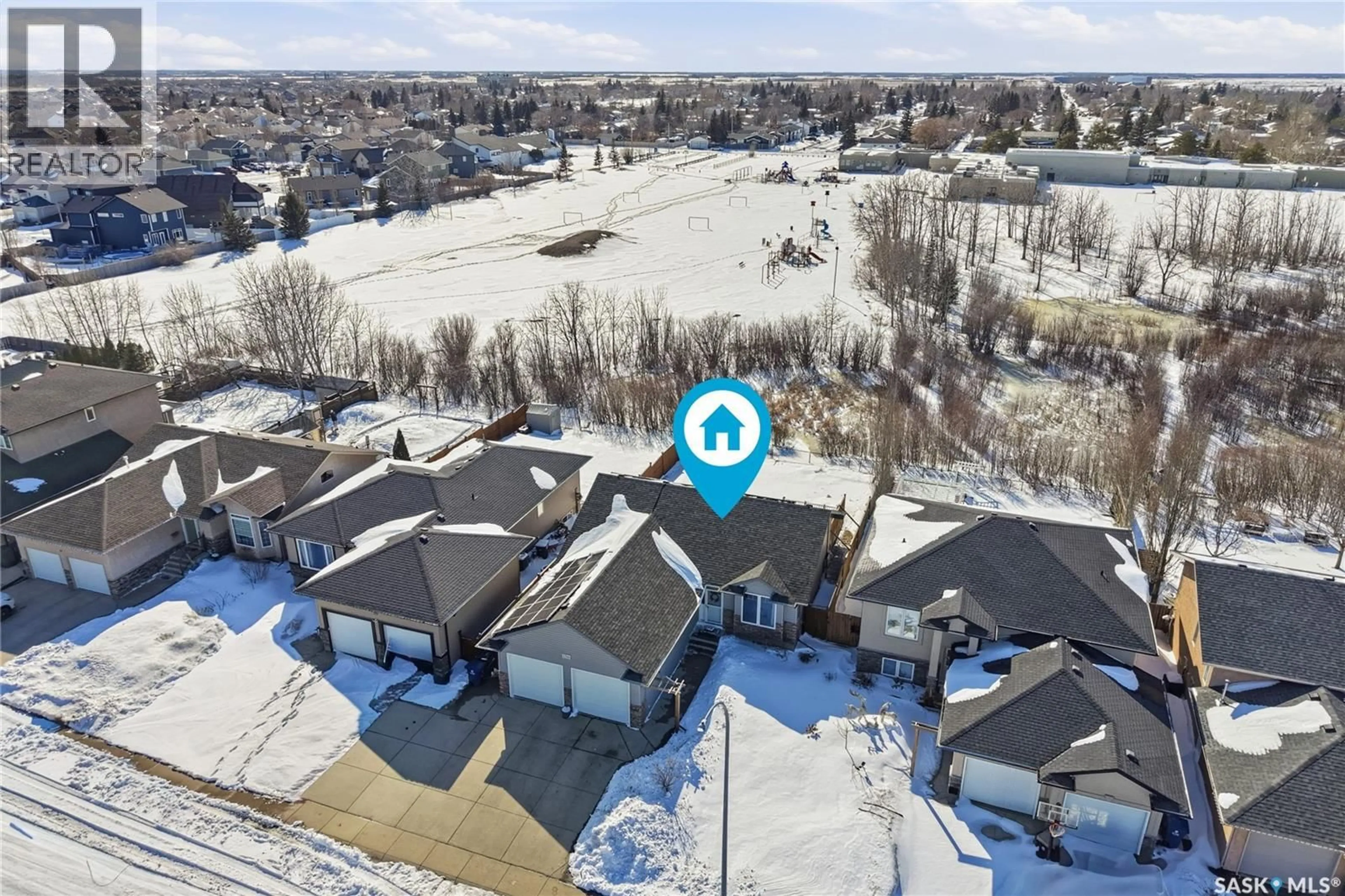 A pic from outside/outdoor area/front of a property/back of a property/a pic from drone, street for 156 MACCORMACK ROAD, Martensville Saskatchewan S0K0A2