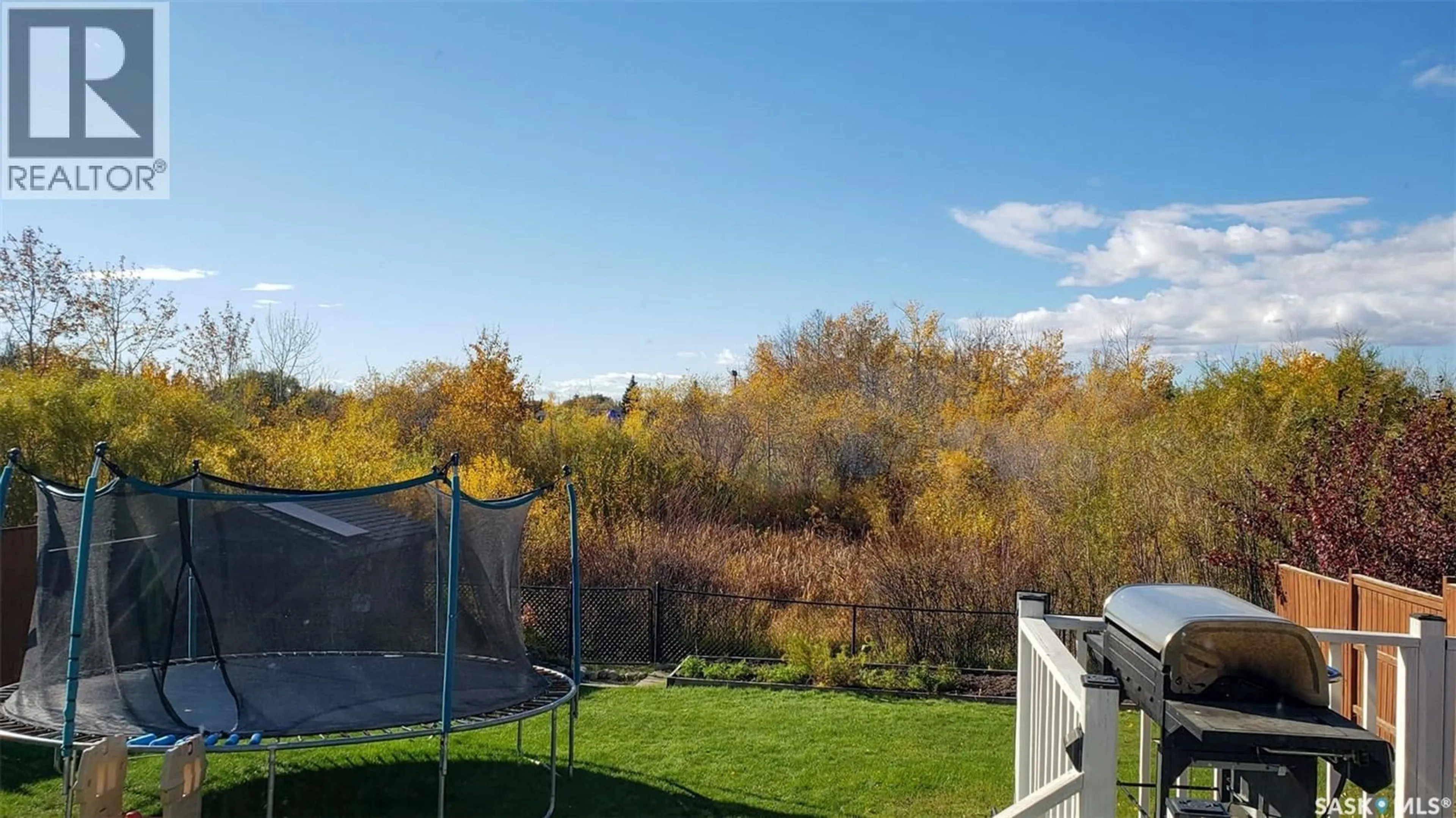 A pic from outside/outdoor area/front of a property/back of a property/a pic from drone, water/lake/river/ocean view for 156 MACCORMACK ROAD, Martensville Saskatchewan S0K0A2