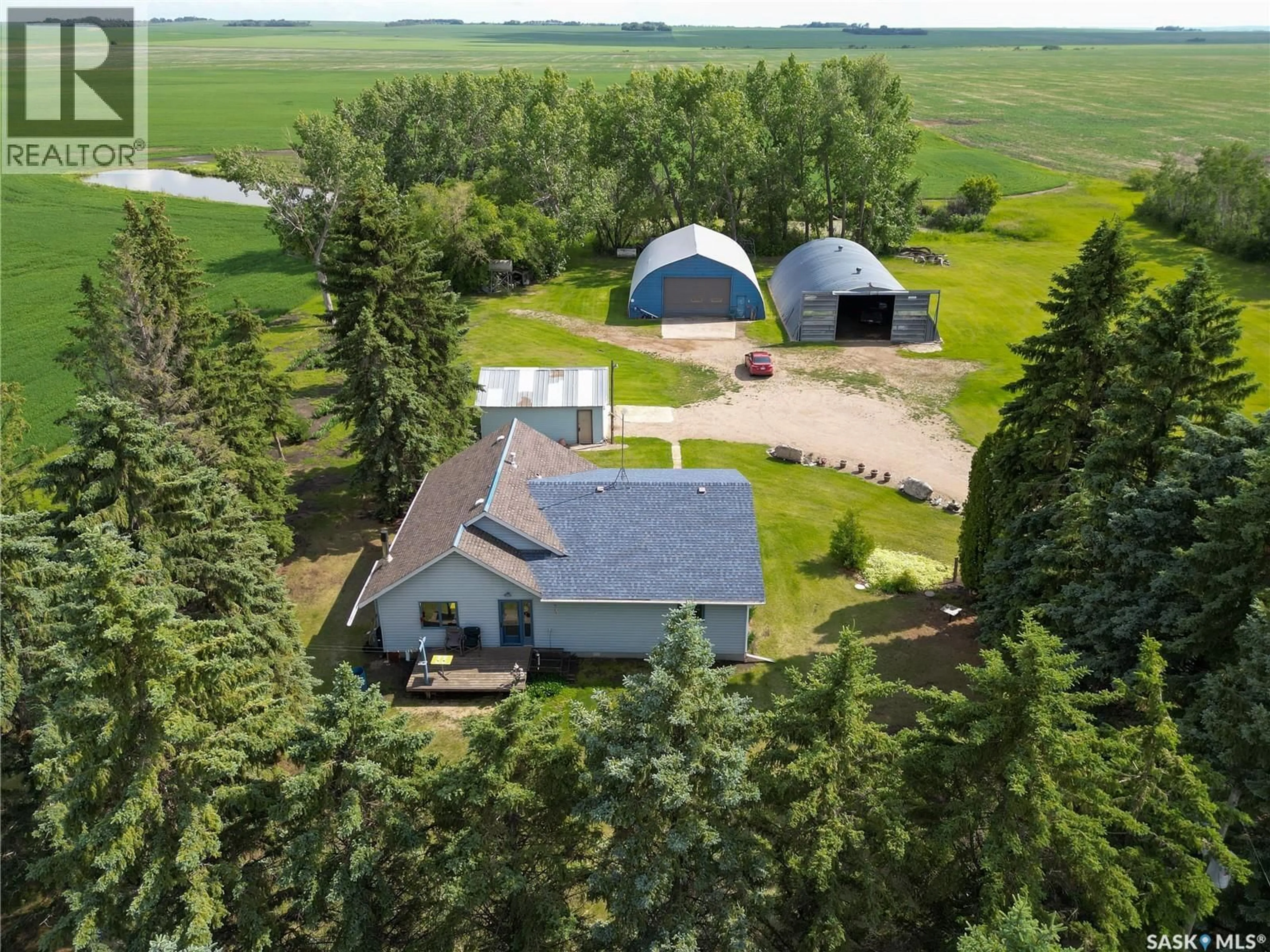 A pic from outside/outdoor area/front of a property/back of a property/a pic from drone, unknown for TESSIER ACREAGE, St. Louis RM No. 431 Saskatchewan S6V5B7