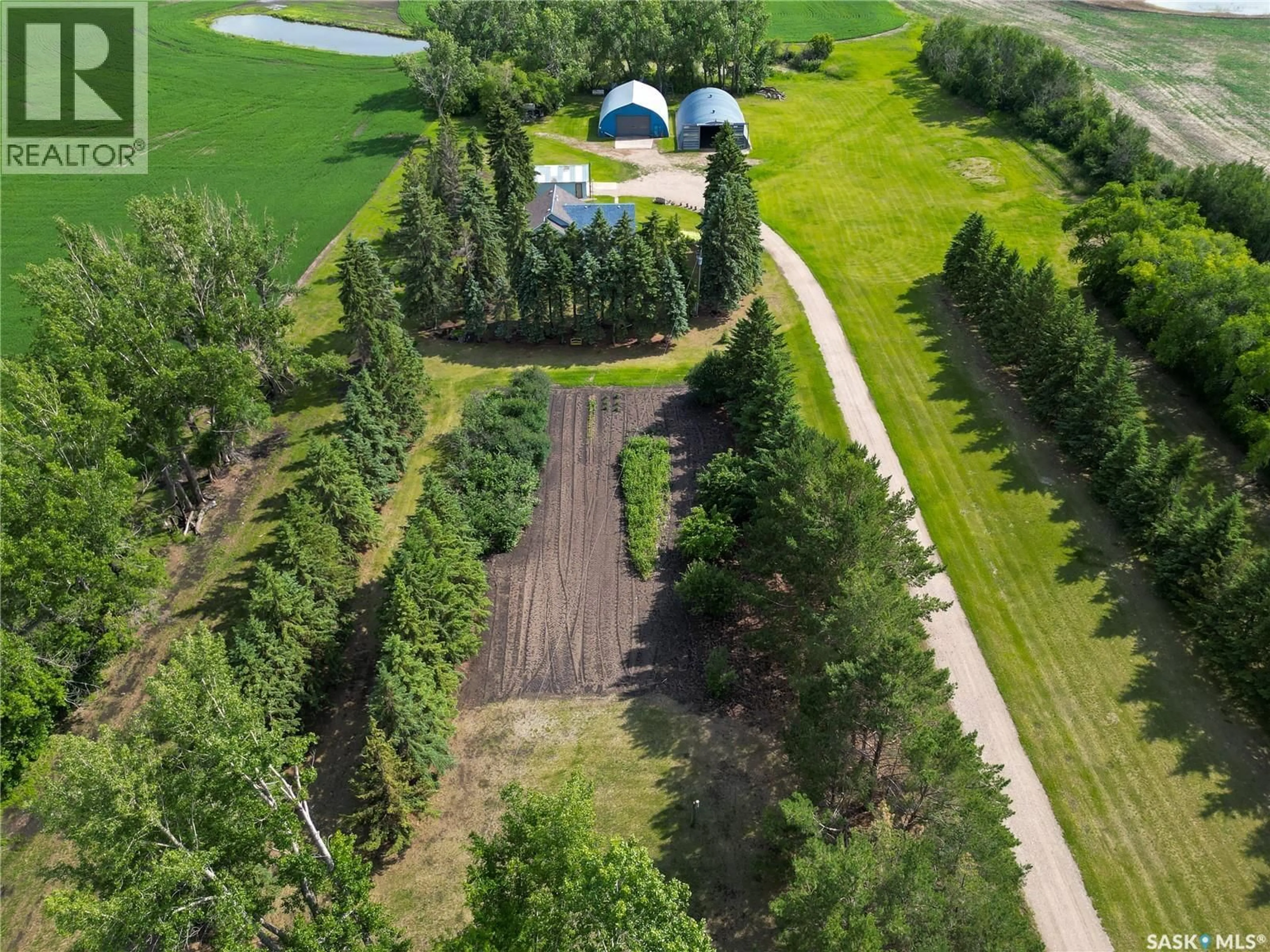 A pic from outside/outdoor area/front of a property/back of a property/a pic from drone, forest/trees view for TESSIER ACREAGE, St. Louis RM No. 431 Saskatchewan S6V5B7