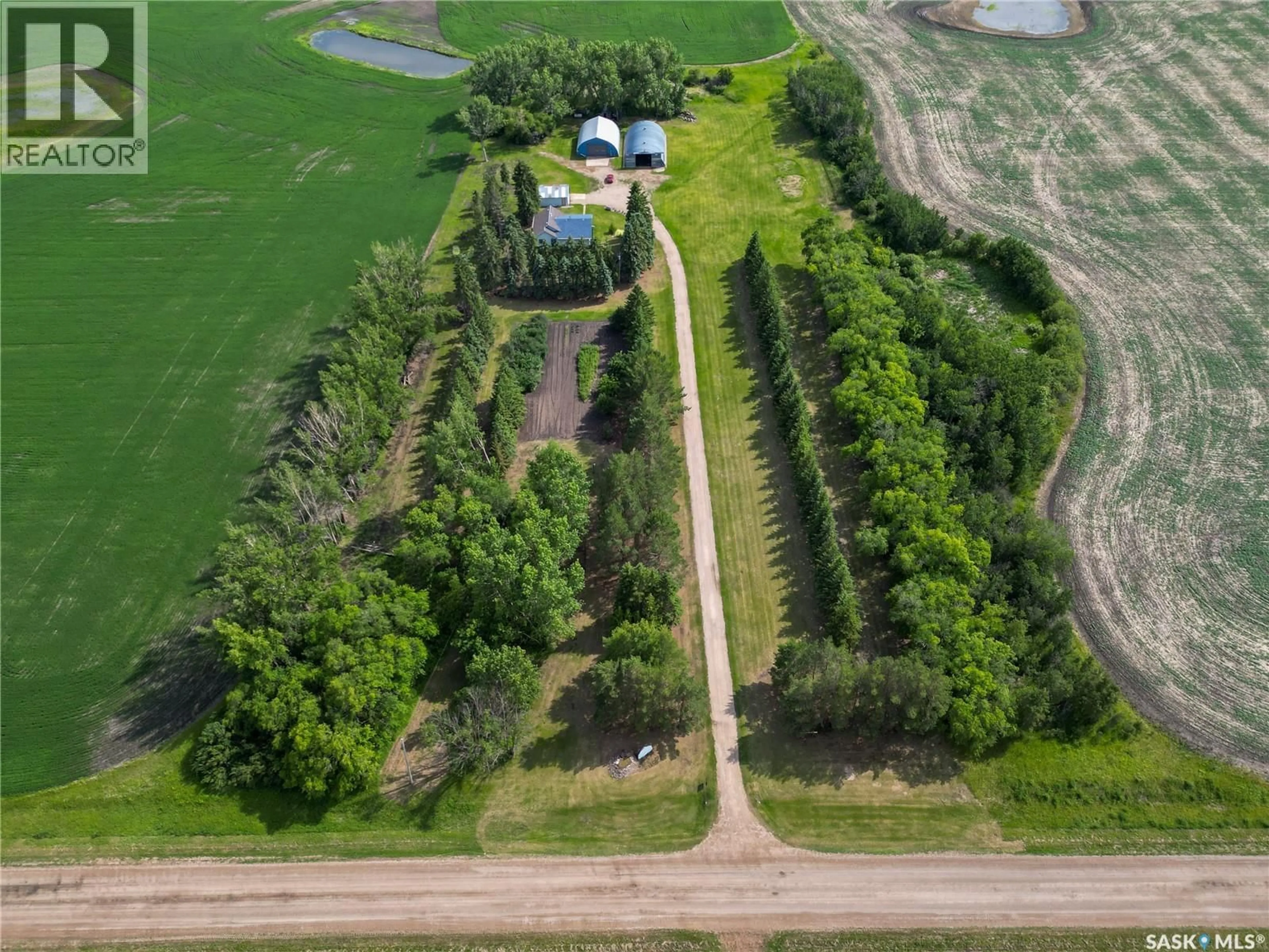 A pic from outside/outdoor area/front of a property/back of a property/a pic from drone, unknown for TESSIER ACREAGE, St. Louis RM No. 431 Saskatchewan S6V5B7
