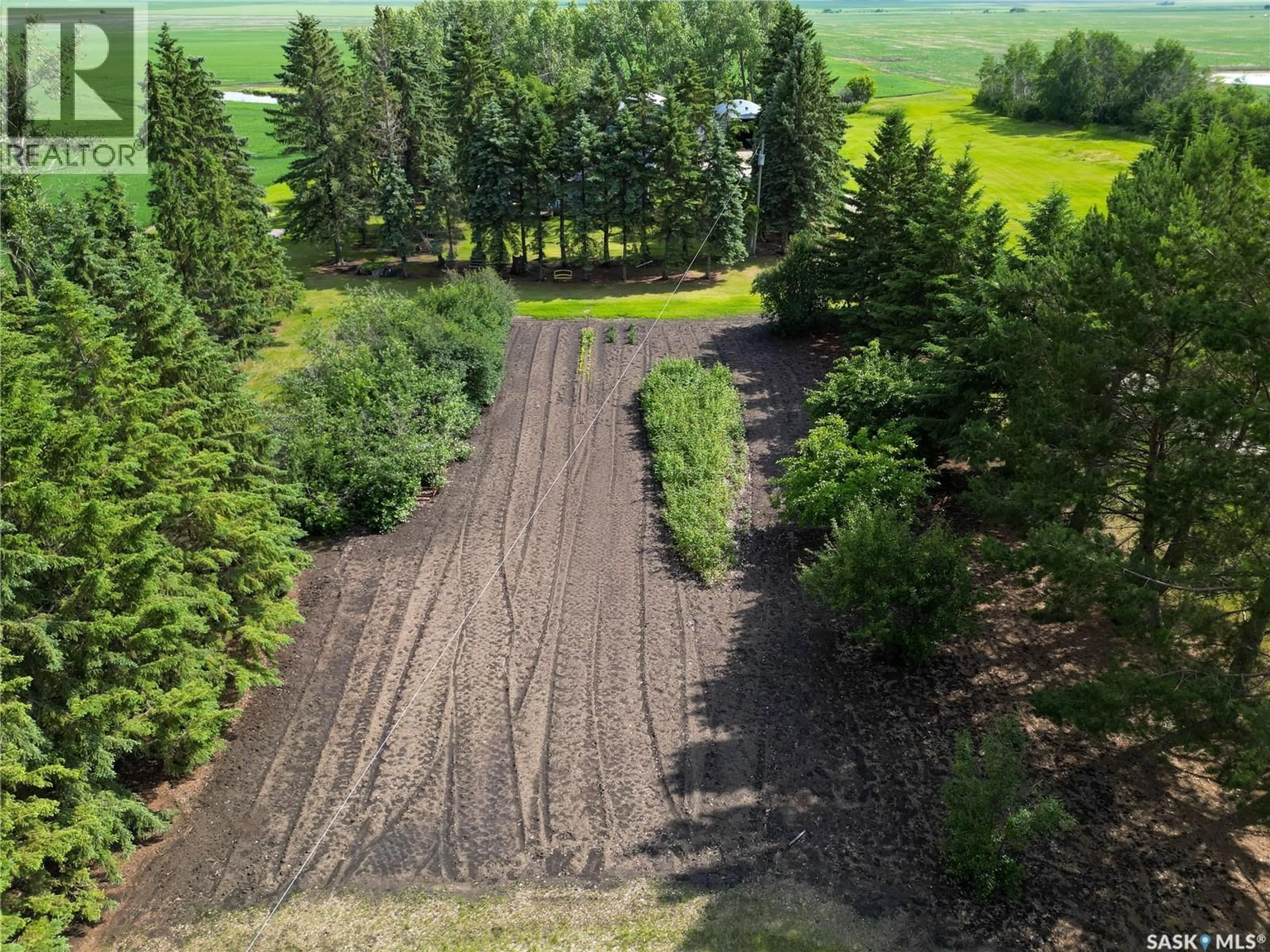 A pic from outside/outdoor area/front of a property/back of a property/a pic from drone, forest/trees view for TESSIER ACREAGE, St. Louis RM No. 431 Saskatchewan S6V5B7