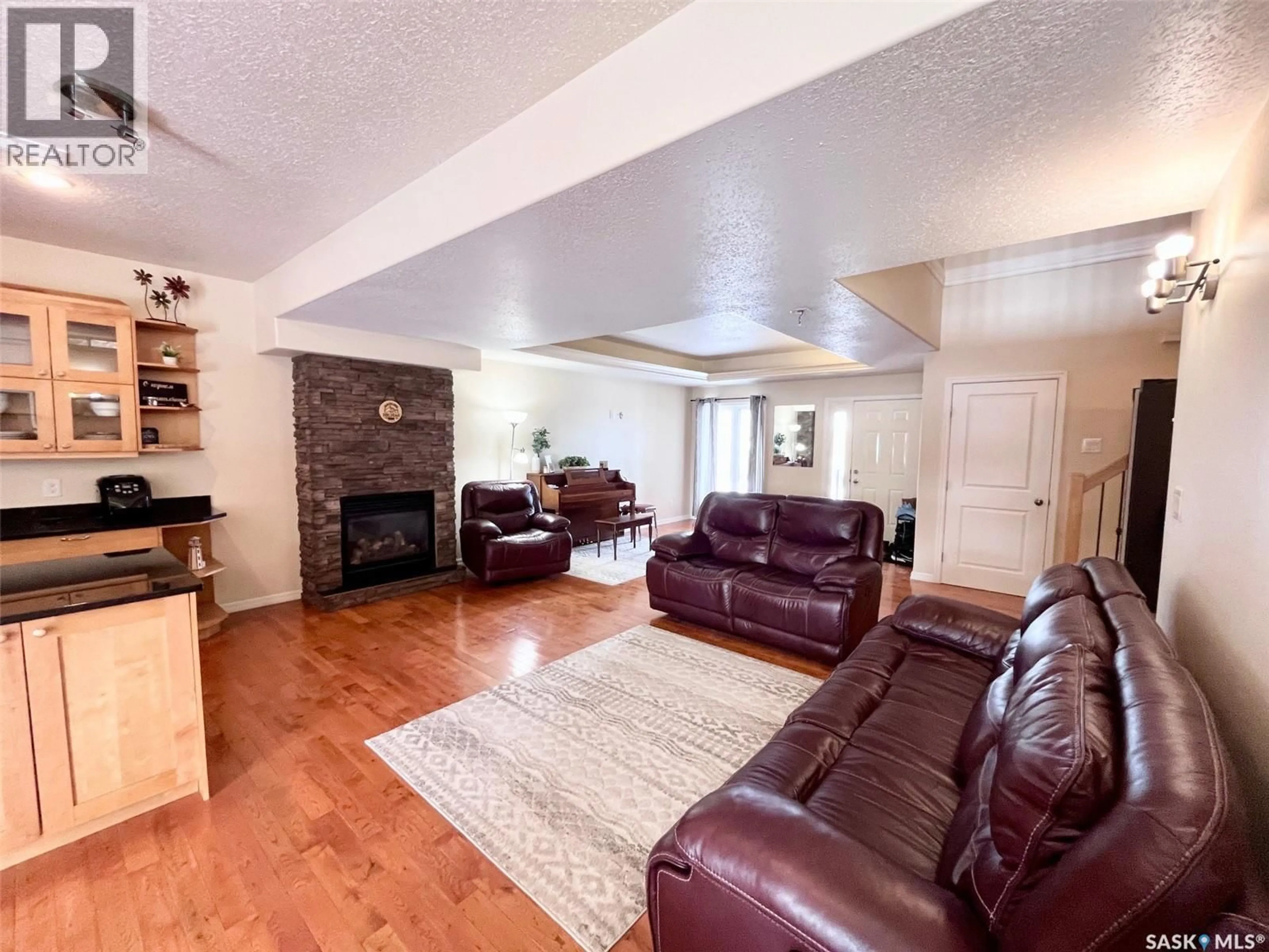 Living room with furniture, unknown for 2 211 20TH STREET, Prince Albert Saskatchewan S6V4G5
