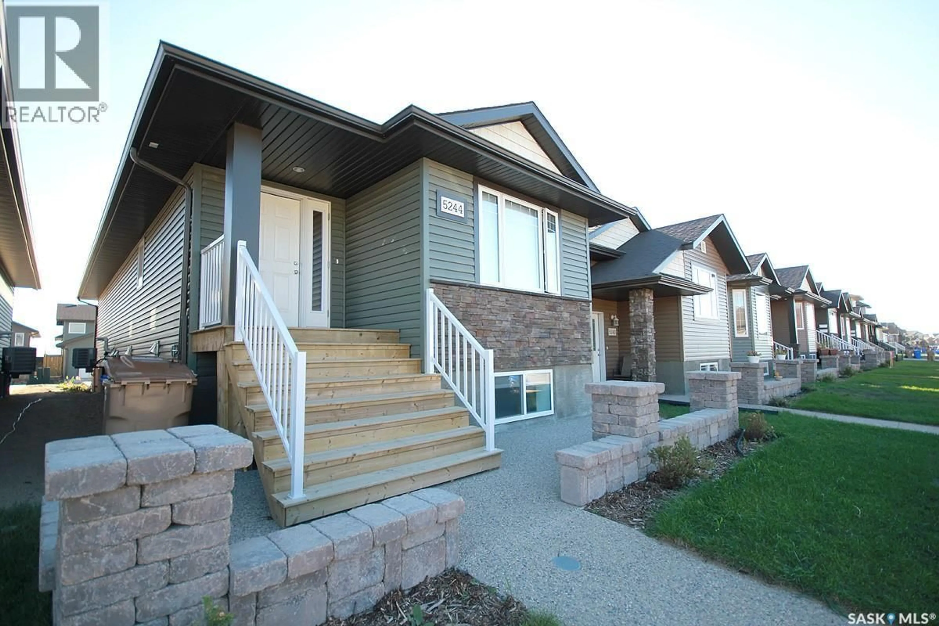 Home with vinyl exterior material, street for 5244 AERIAL CRESCENT, Regina Saskatchewan S4W0C8
