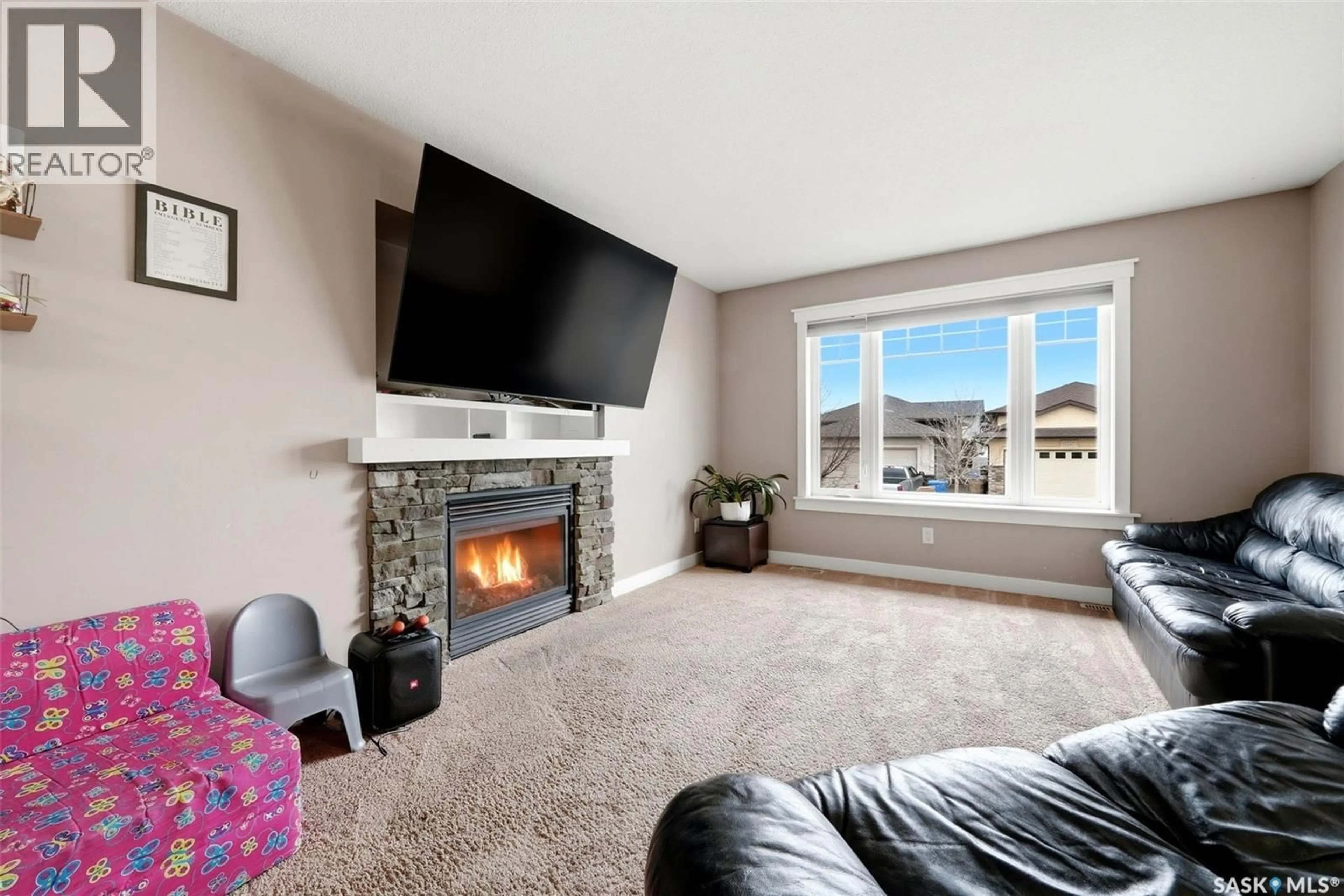 Living room with furniture, carpet floor for 5244 AERIAL CRESCENT, Regina Saskatchewan S4W0C8