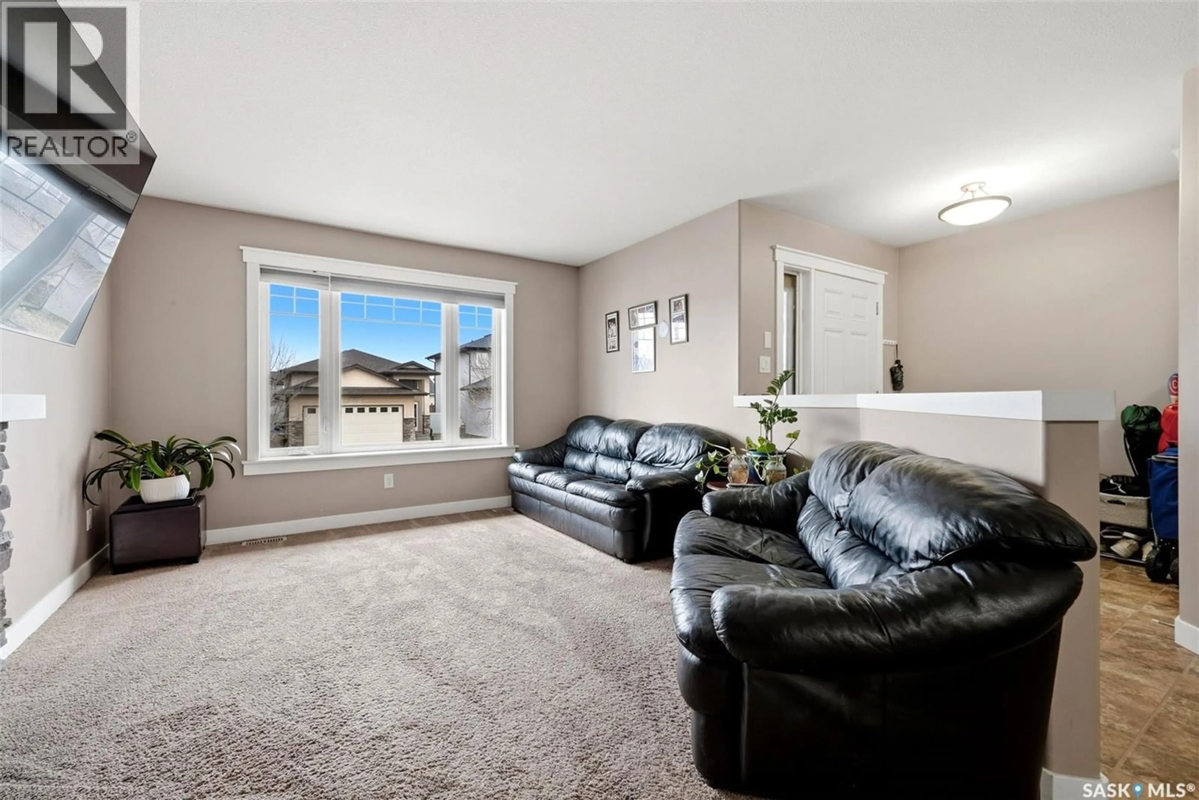 Living room with furniture, carpet floor for 5244 AERIAL CRESCENT, Regina Saskatchewan S4W0C8