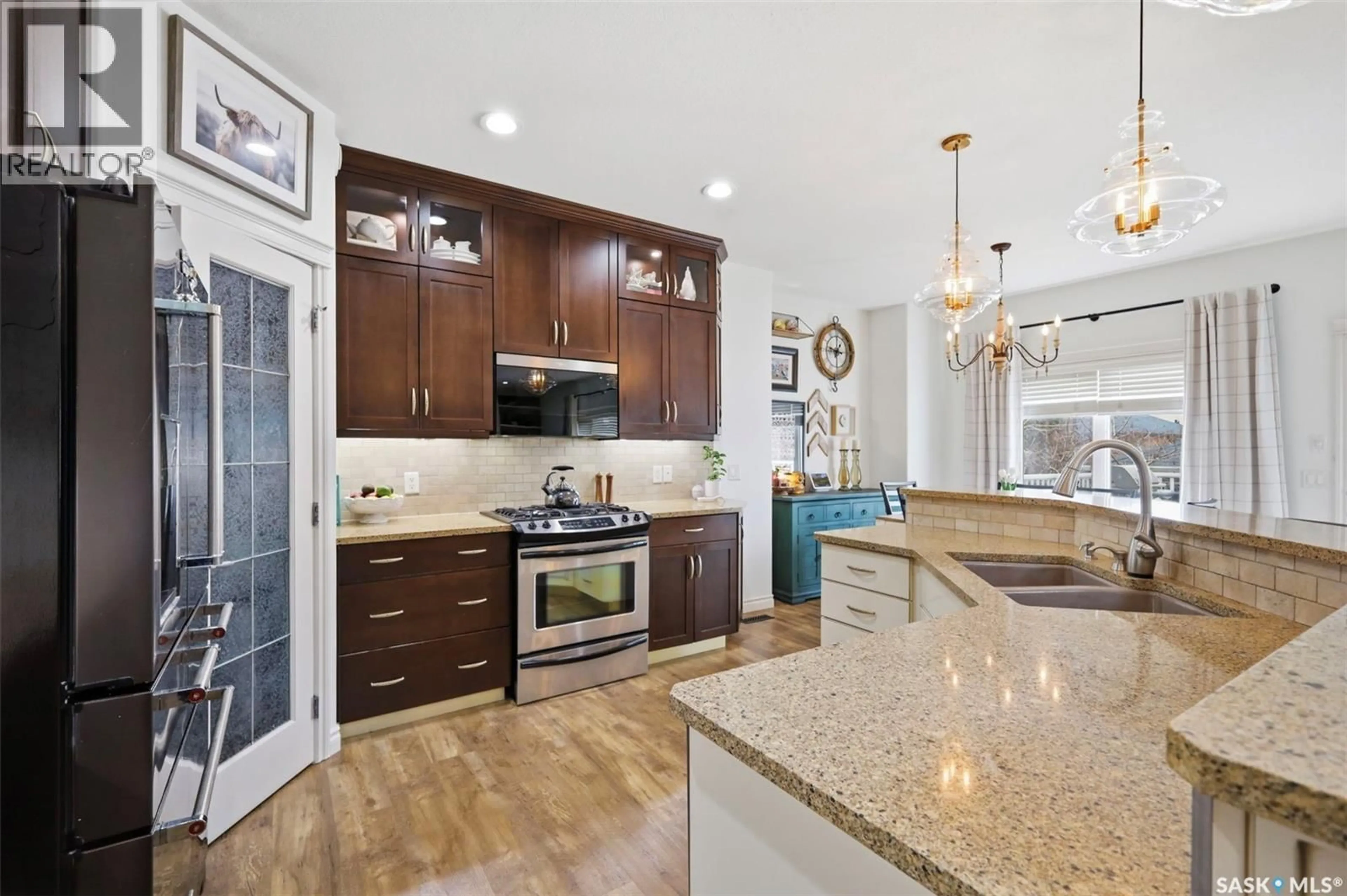 Open concept kitchen, ceramic/tile floor for 106 MCINTOSH STREET, Saskatoon Saskatchewan S7T0A8