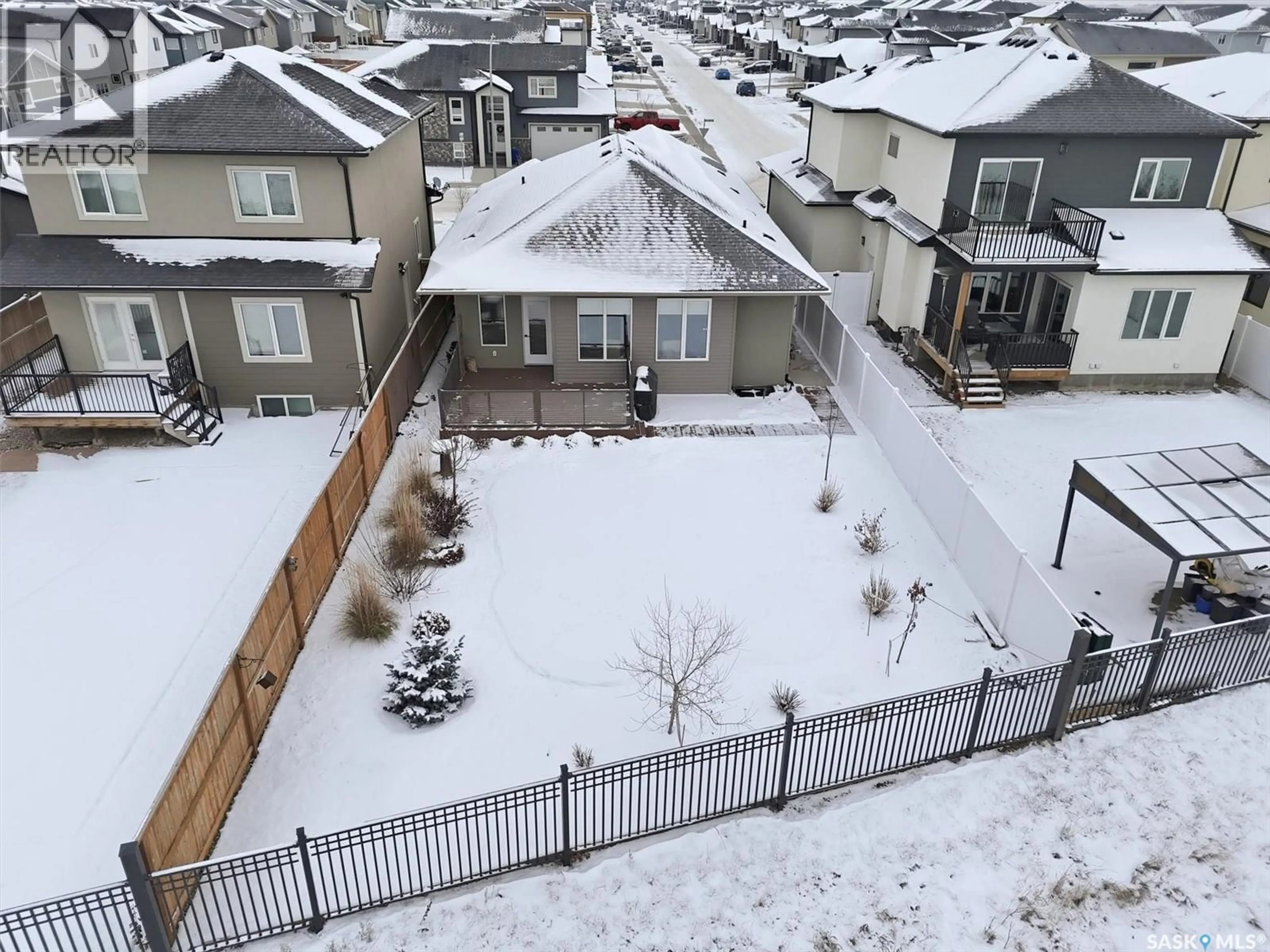A pic from outside/outdoor area/front of a property/back of a property/a pic from drone, mountain view for 132 FORSEY AVENUE, Saskatoon Saskatchewan S7W0Z6