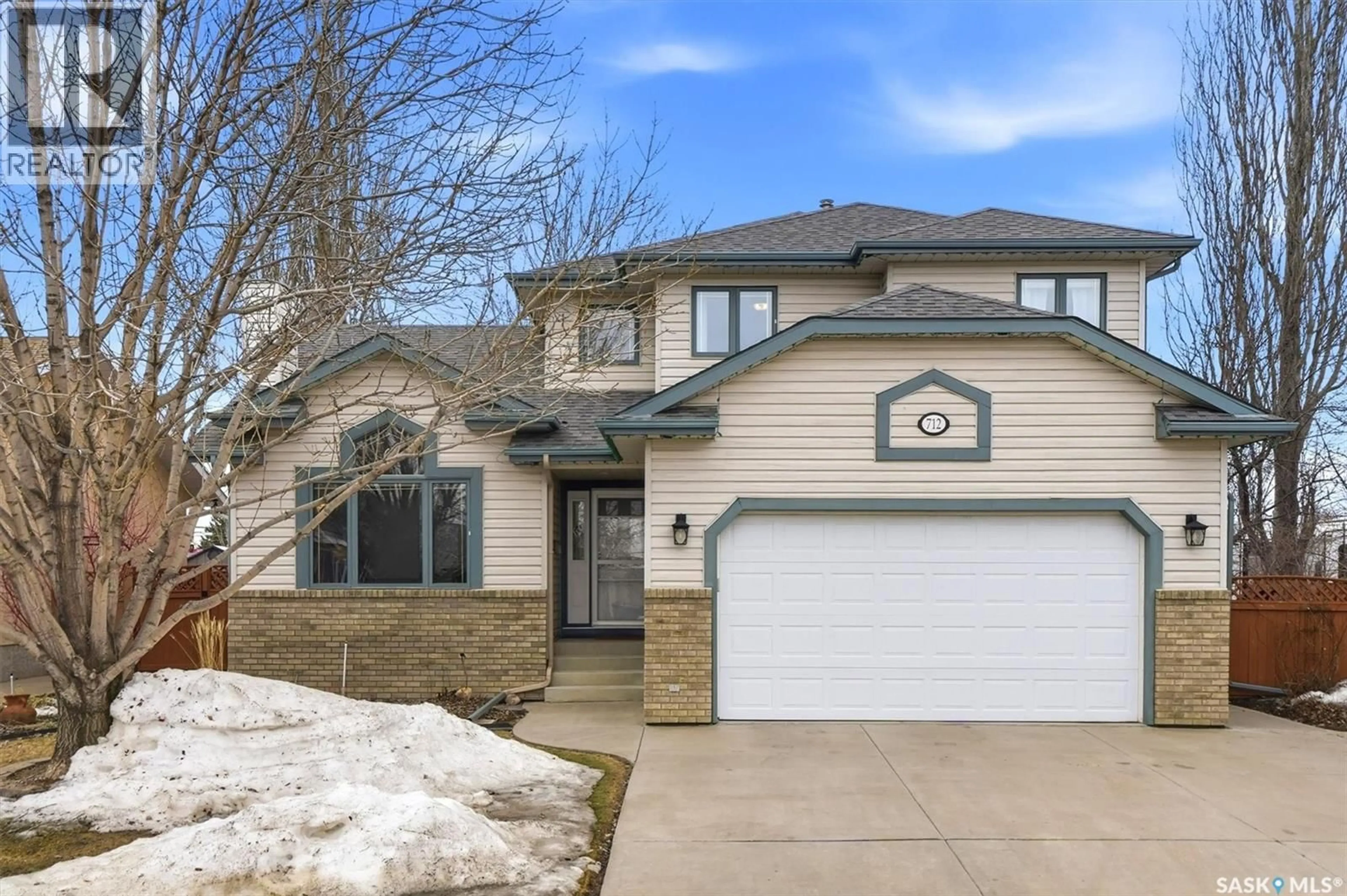 Home with brick exterior material, street for 712 SLATER CRESCENT, Martensville Saskatchewan S0K2T0