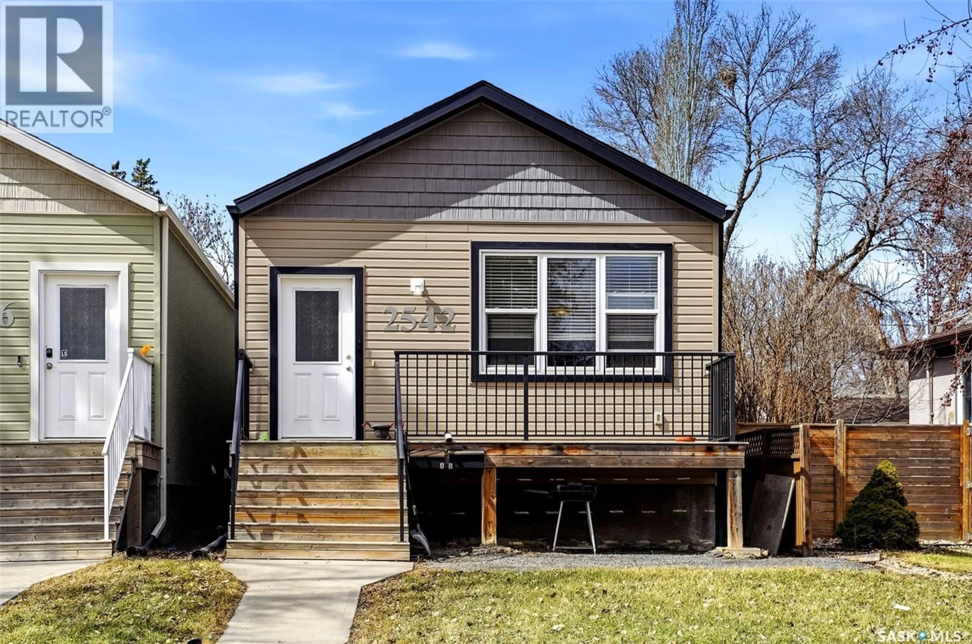 Home with vinyl exterior material, street for 2542 MCDONALD STREET, Regina Saskatchewan S4N2Z5