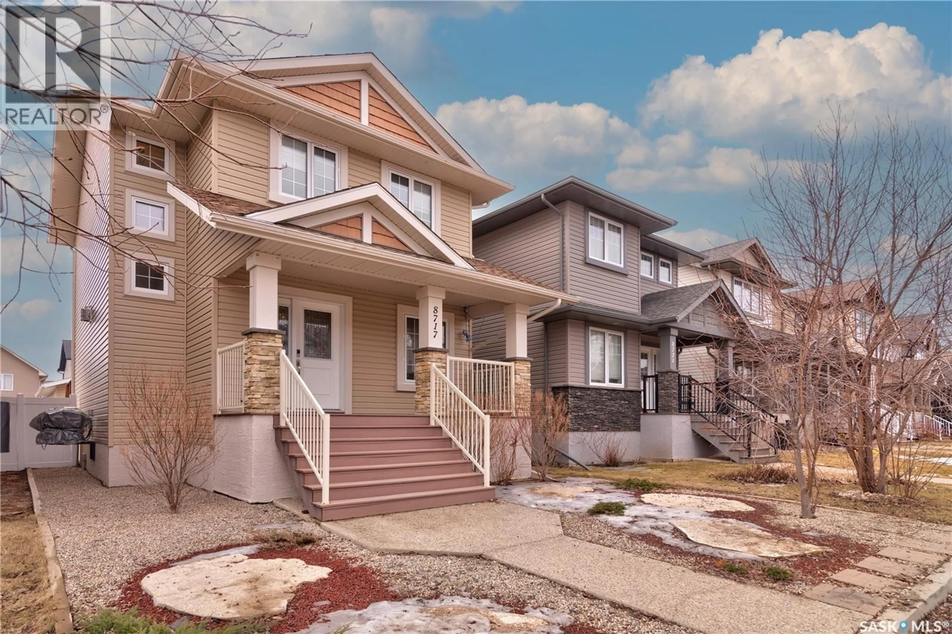 Home with vinyl exterior material, street for 8717 ARCHER LANE, Regina Saskatchewan S4Y0B9
