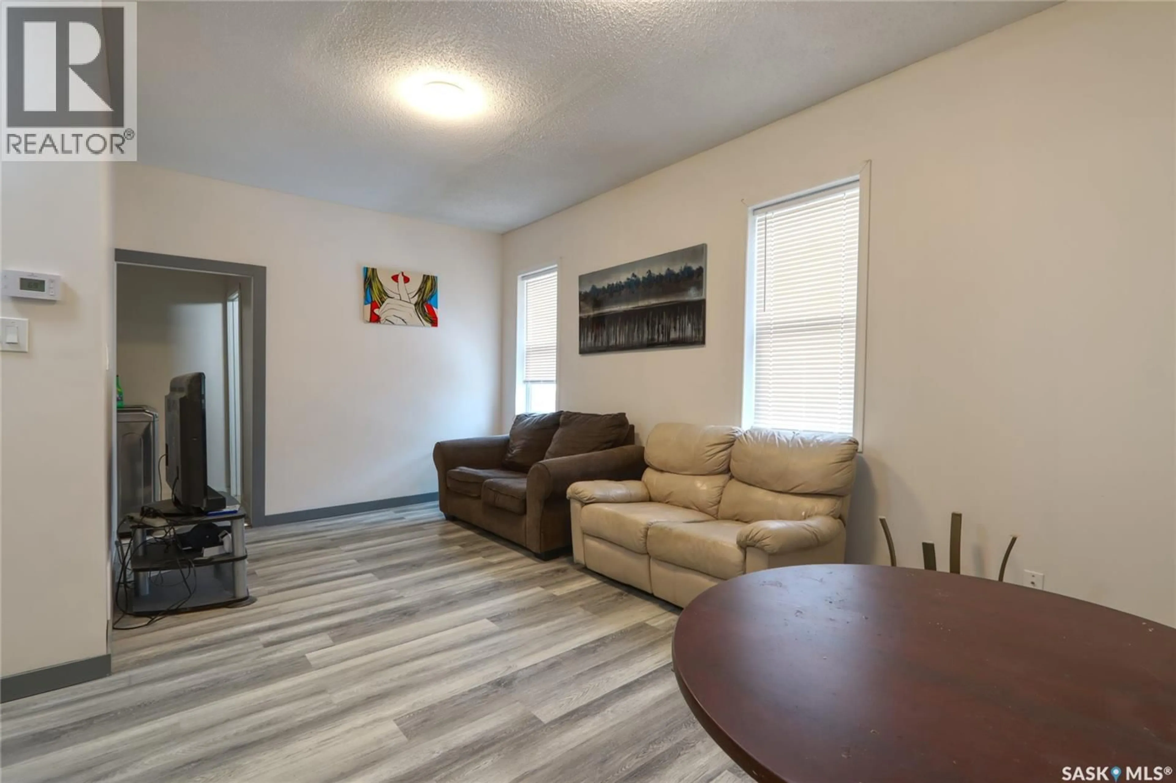 Living room with furniture, unknown for 1879 ST JOHN STREET, Regina Saskatchewan S4P1S2