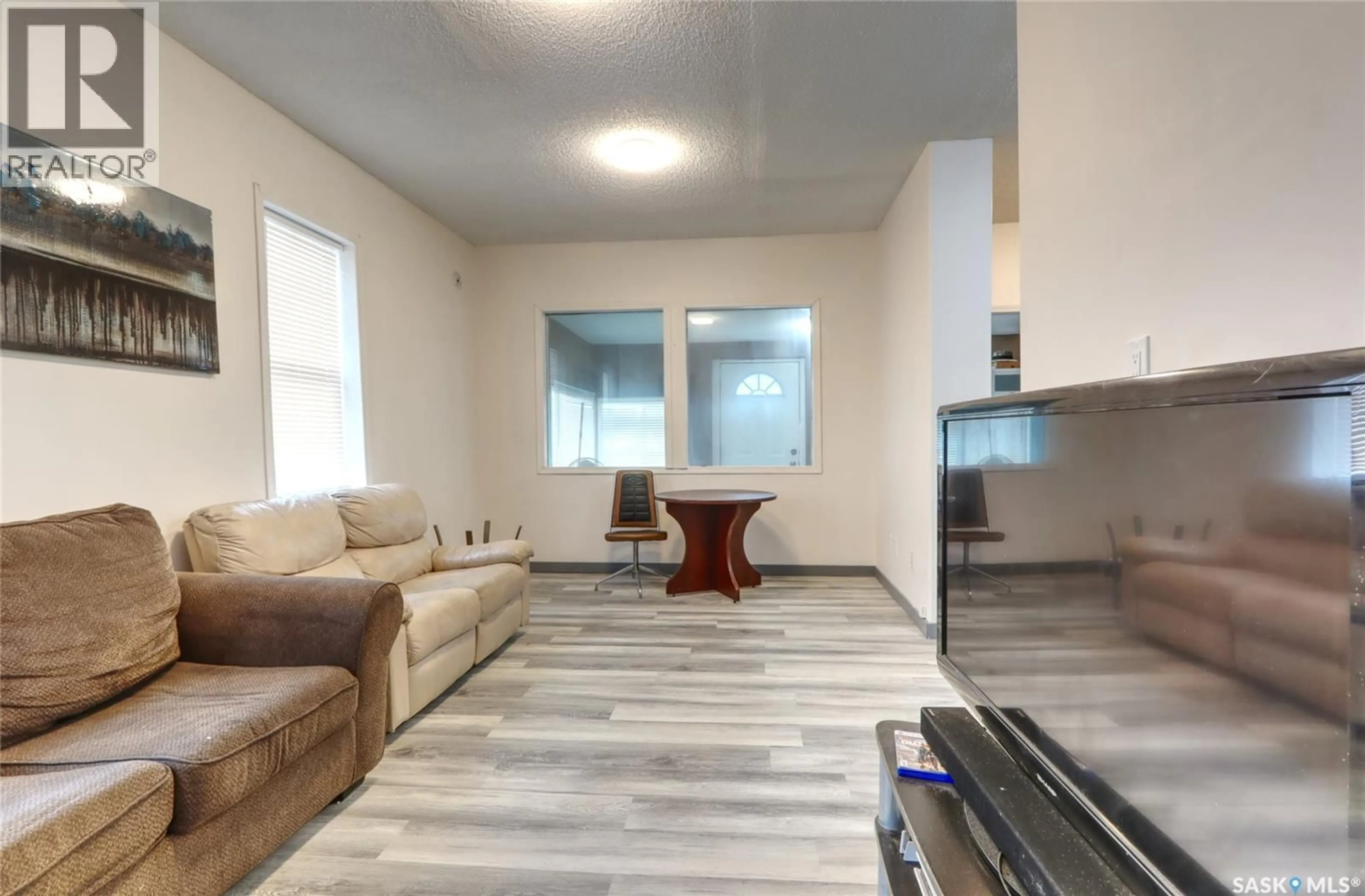 Living room with furniture, unknown for 1879 ST JOHN STREET, Regina Saskatchewan S4P1S2