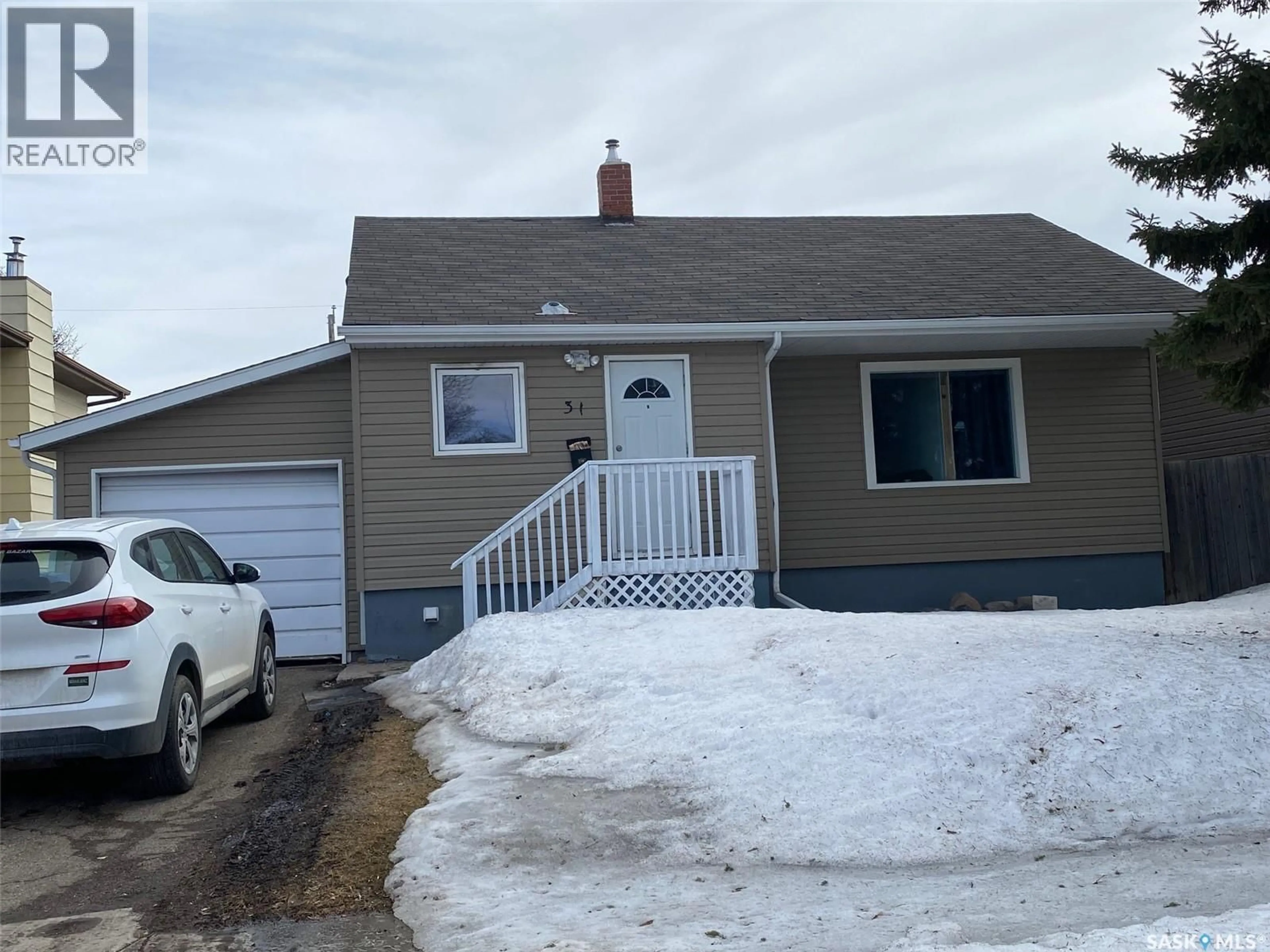 Home with vinyl exterior material, street for 31 IRWIN AVENUE, Yorkton Saskatchewan S3N4C6