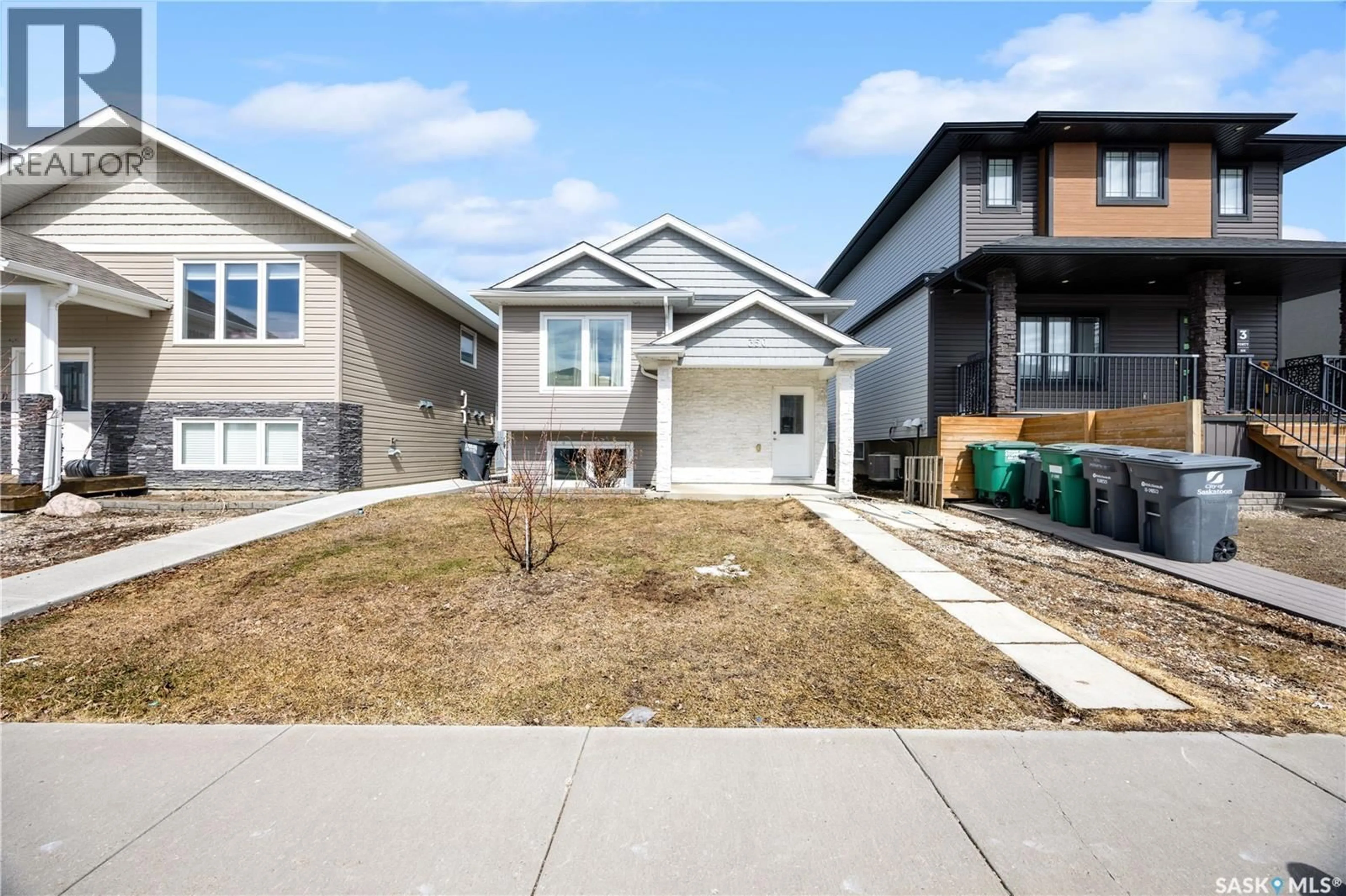 Home with vinyl exterior material, street for 350 MARLATTE STREET, Saskatoon Saskatchewan S7W0S7