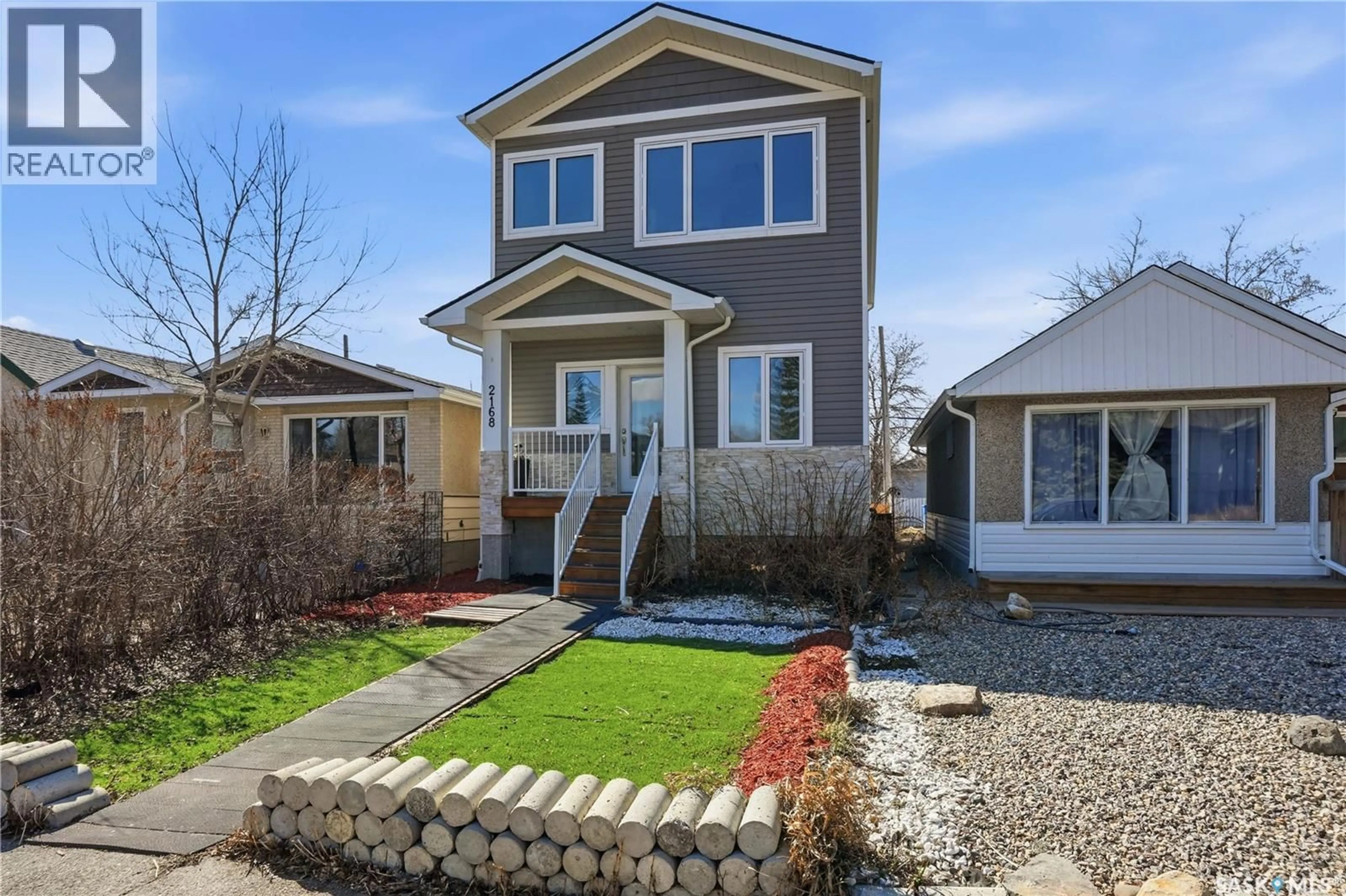 Home with vinyl exterior material, street for 2168 WASCANA STREET, Regina Saskatchewan S4T4J9