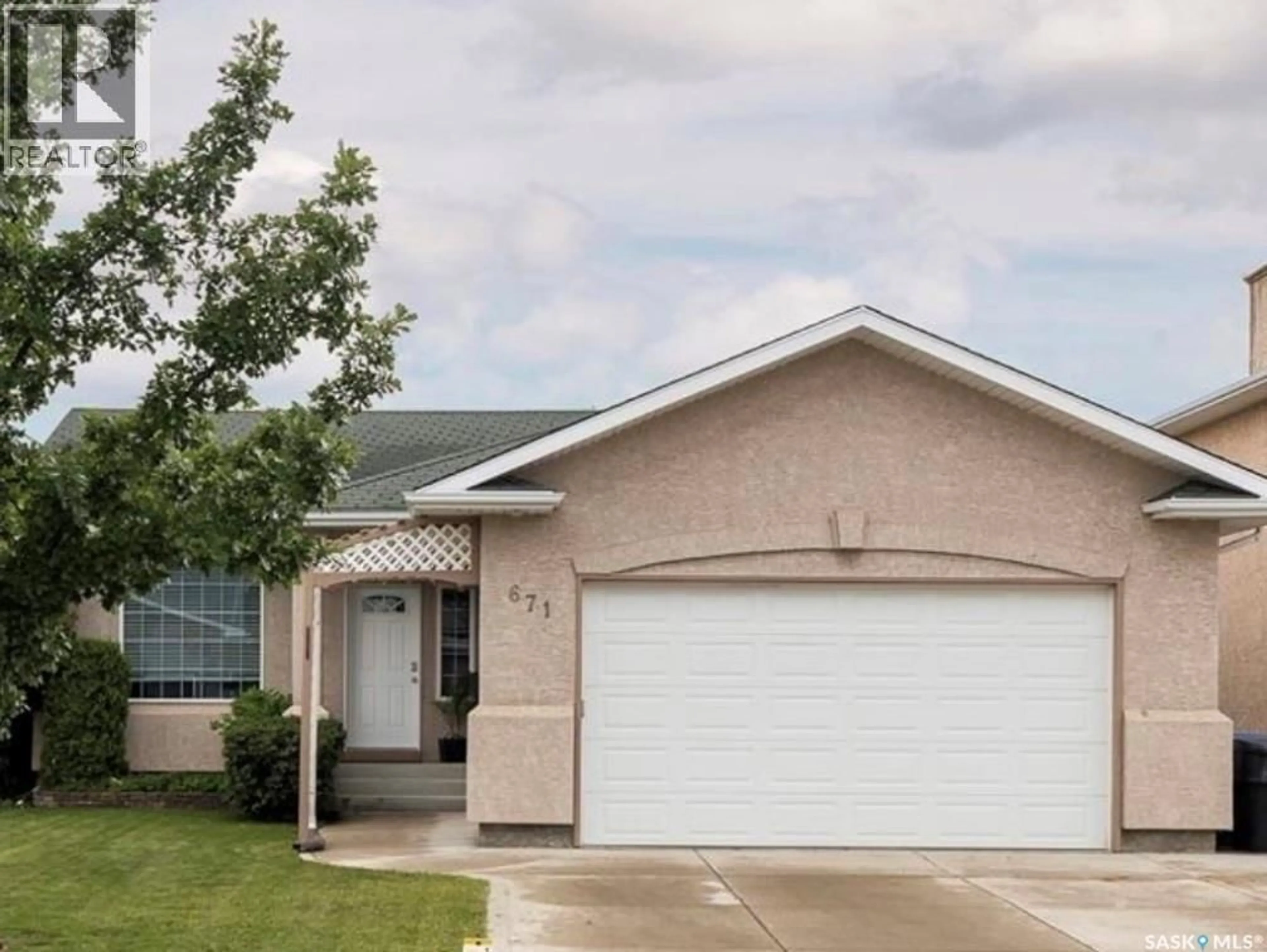 Home with vinyl exterior material, street for 671 FAIRBROTHER PLACE, Saskatoon Saskatchewan S7S1J2