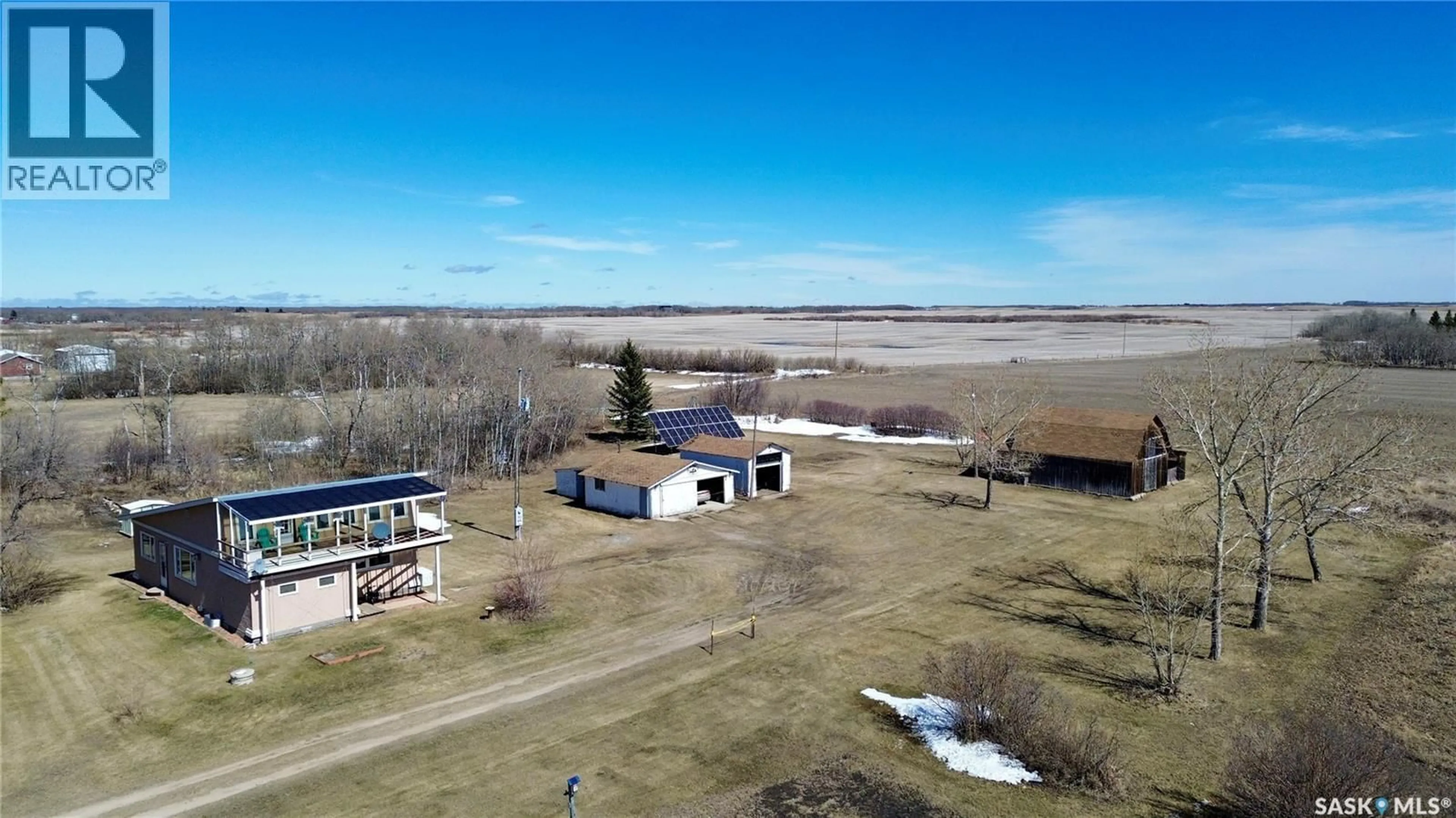 A pic from outside/outdoor area/front of a property/back of a property/a pic from drone, unknown for WAUGH ACREAGE, Edenwold Rm No.158 Saskatchewan S0G5K0