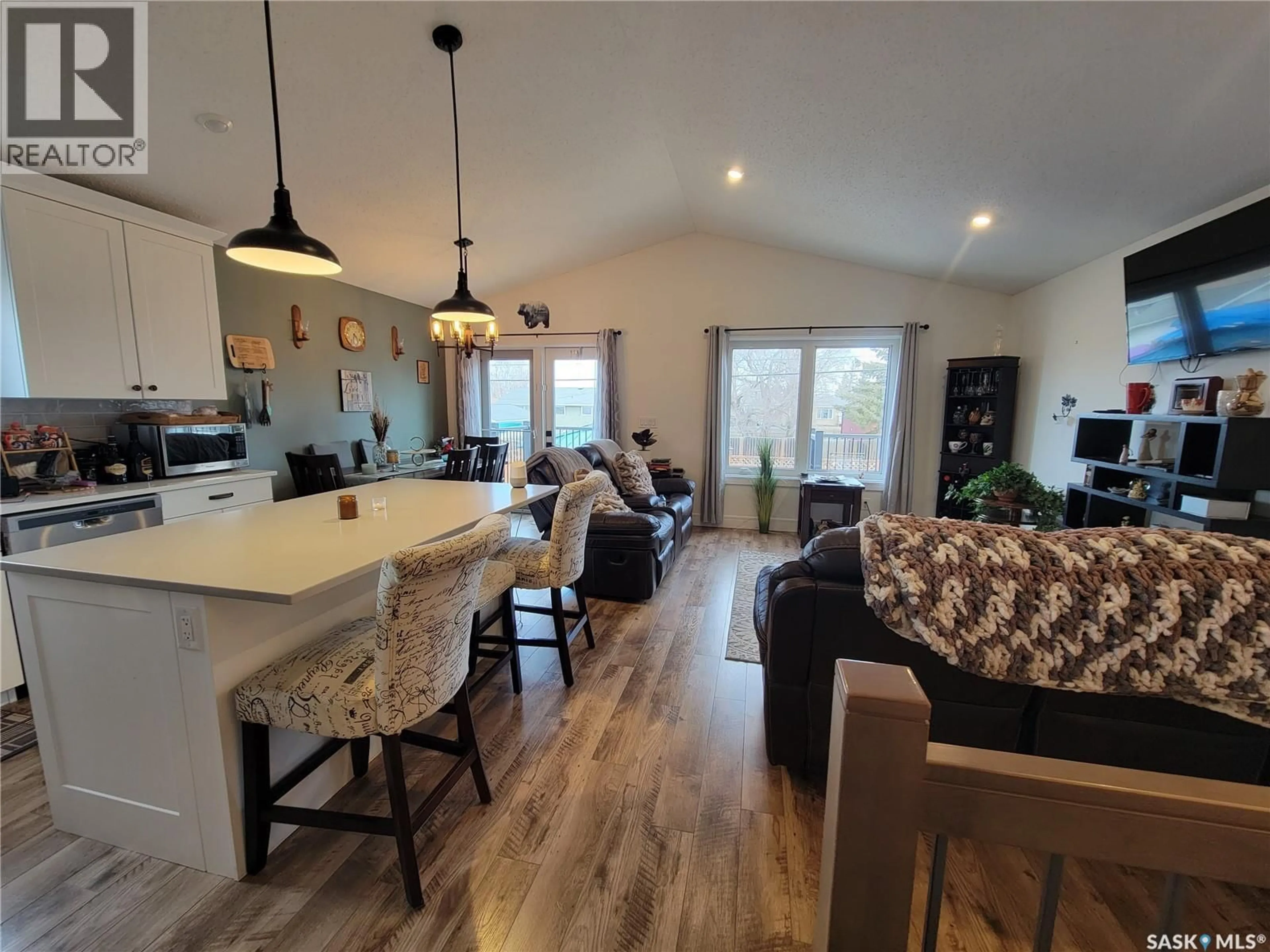 Open concept kitchen, wood/laminate floor for 214 1ST AVENUE, Maidstone Saskatchewan S0M1M0
