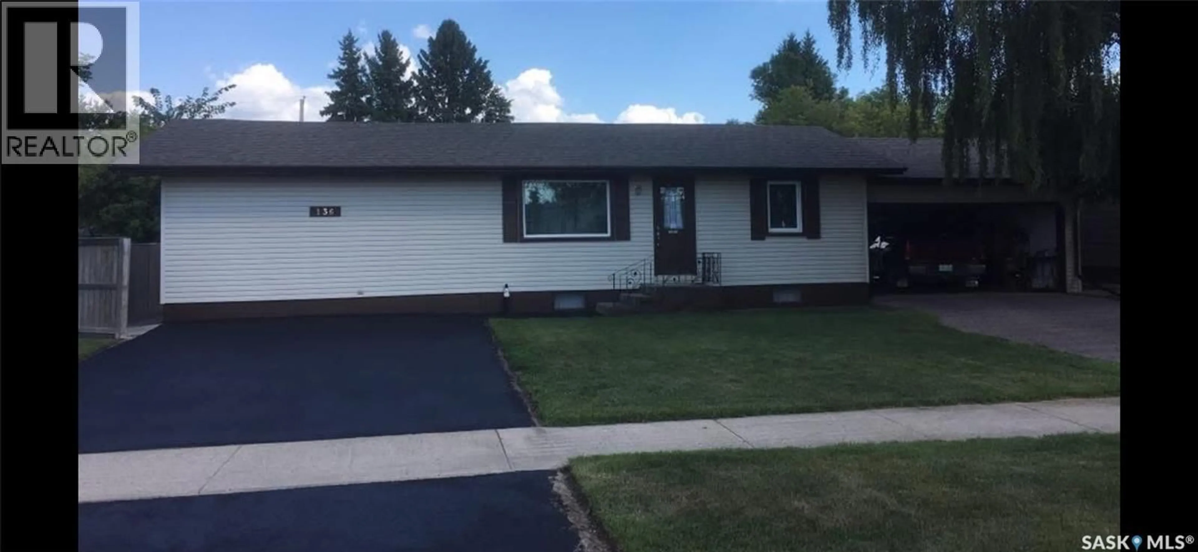 Home with vinyl exterior material, street for 136 6TH STREET, Humboldt Saskatchewan S0K2A0