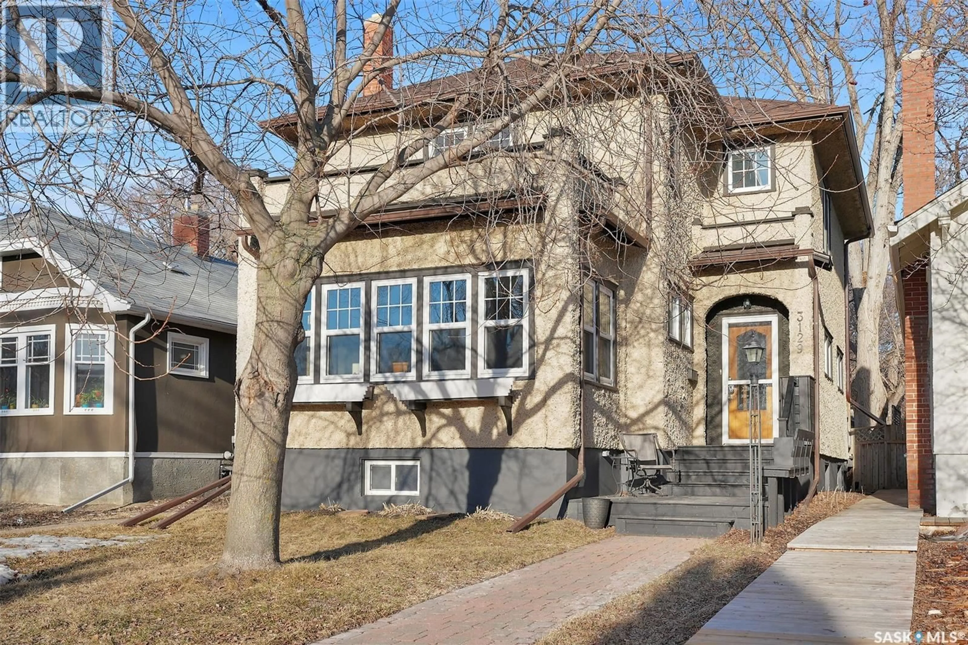 Home with brick exterior material, street for 3129 RAE STREET, Regina Saskatchewan S4S1R9