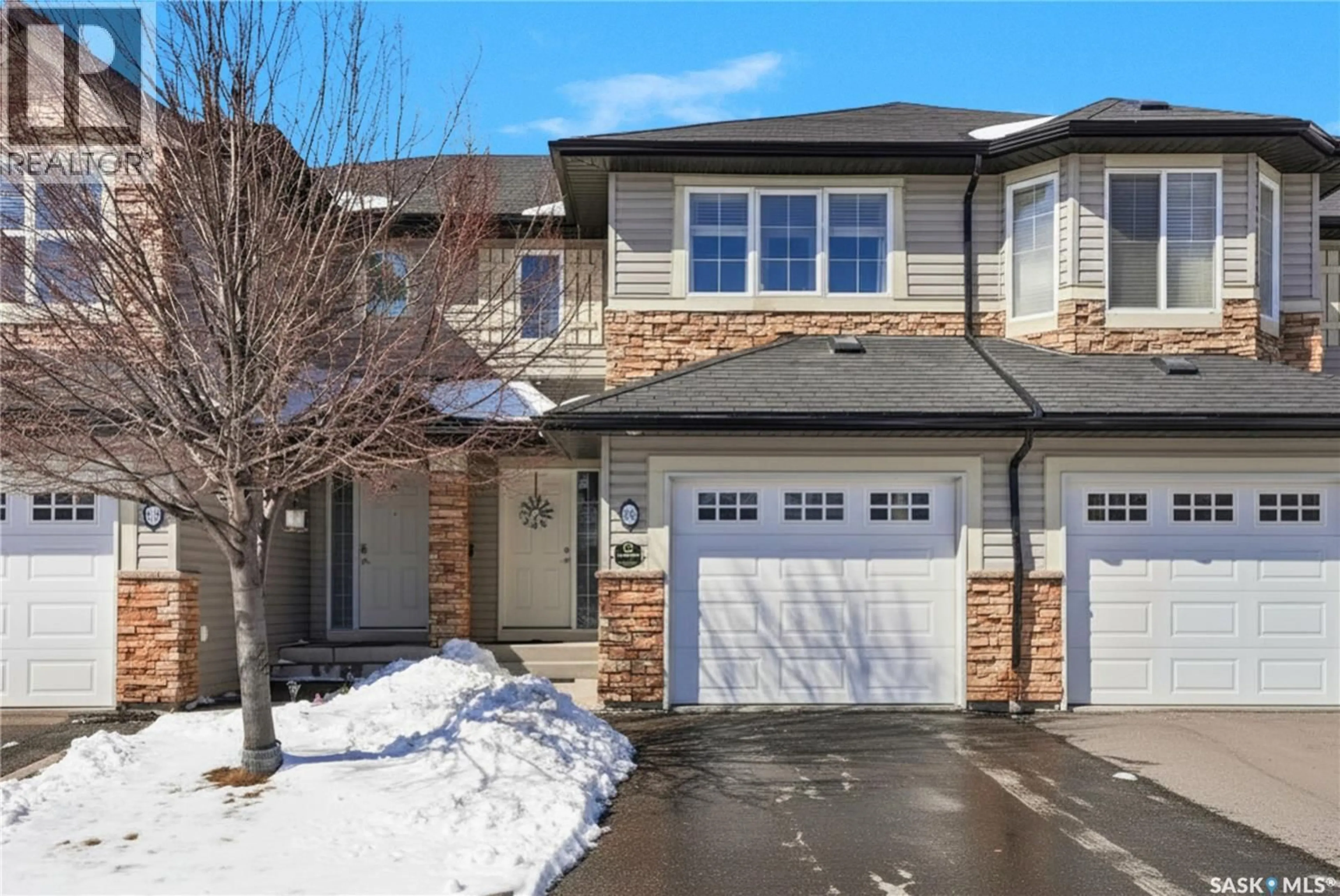 Home with brick exterior material, street for 402 615 LYND CRESCENT, Saskatoon Saskatchewan S7T0G8